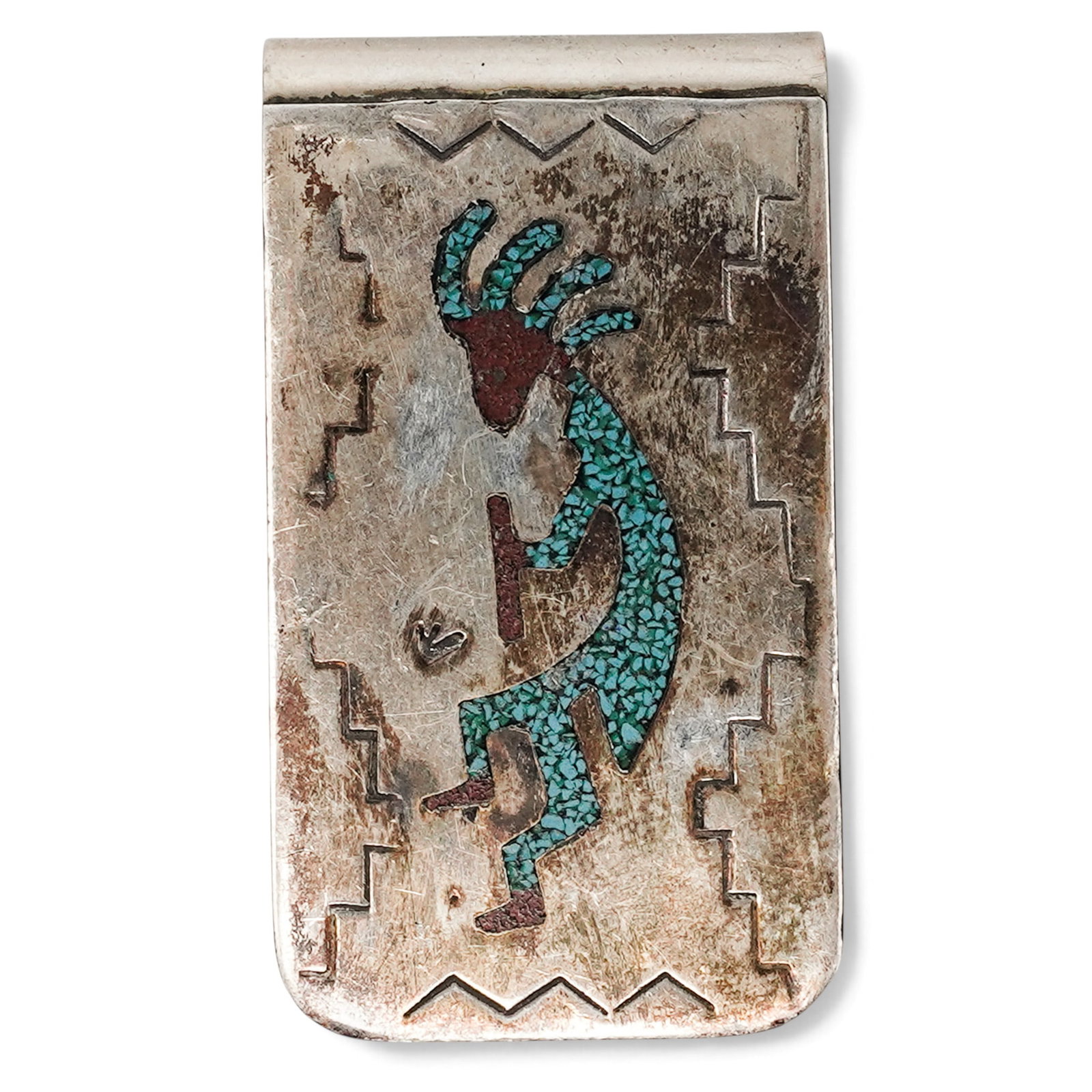 A Elaine Becenti Navajo Sterling Silver And Turquoise Chip Inlay Kokopelli Money Clip: A Elaine Becenti Navajo Sterling Silver And Turquoise Chip Inlay Kokopelli Money Clip Late 20th century Stamped: Sterling / B. A rectangular silver money clip with turquoise chip inlay Kokopelli figur
