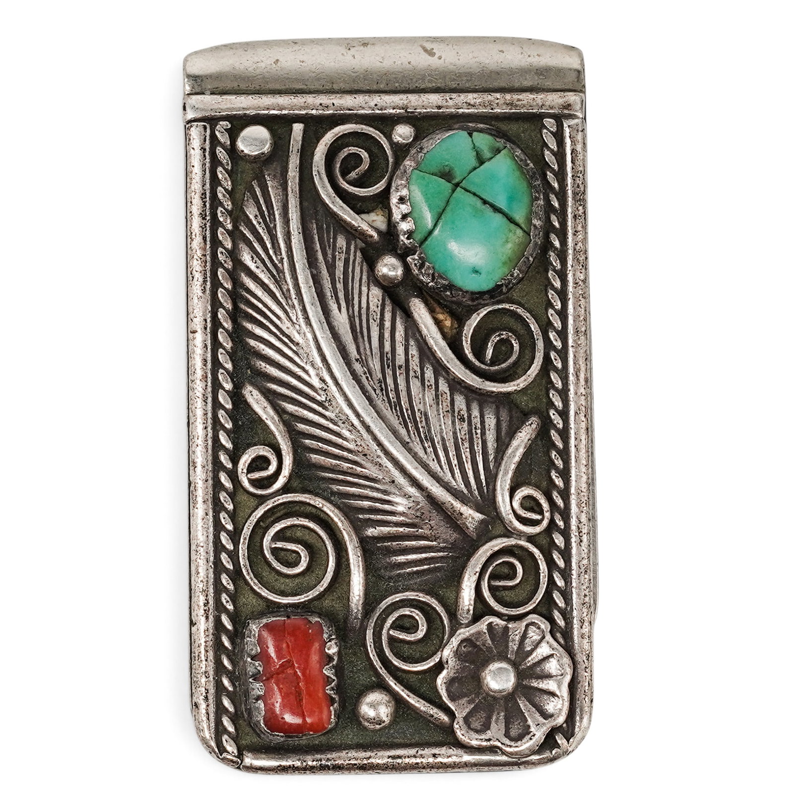 A Navajo Sterling Silver, Turquoise, And Coral Feather Money Clip: A Navajo Sterling Silver, Turquoise, And Coral Feather Money Clip Late 20th century Unmarked. Tested sterling silver. A rectangular silver money clip with bezel-set turquoise and coral cabochons, acce