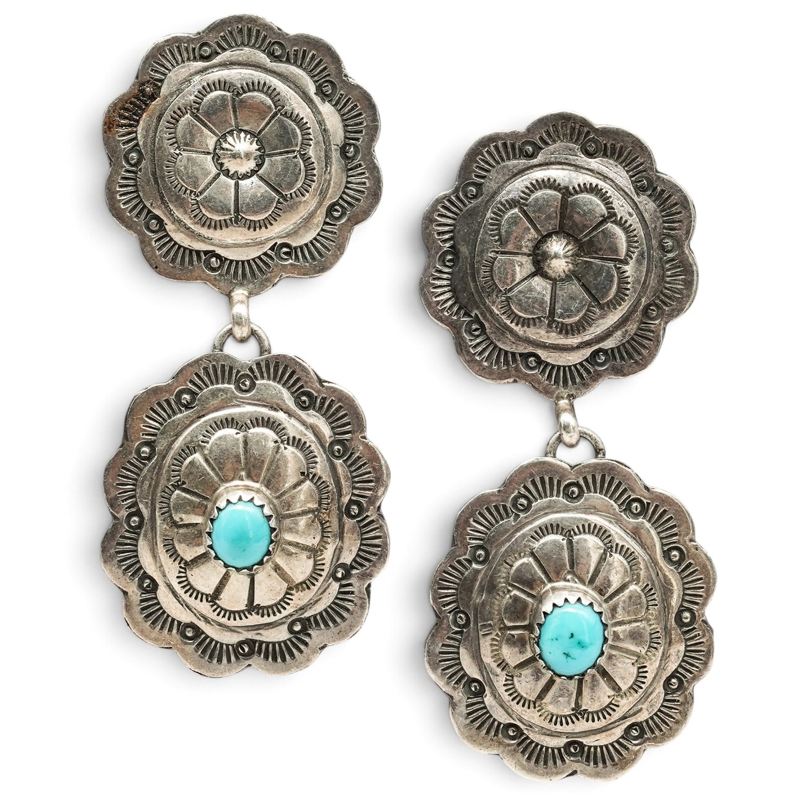 A Pair Of Navajo Sterling Silver And Turquoise Stamped Concho Dangle Earrings (1 of 4)