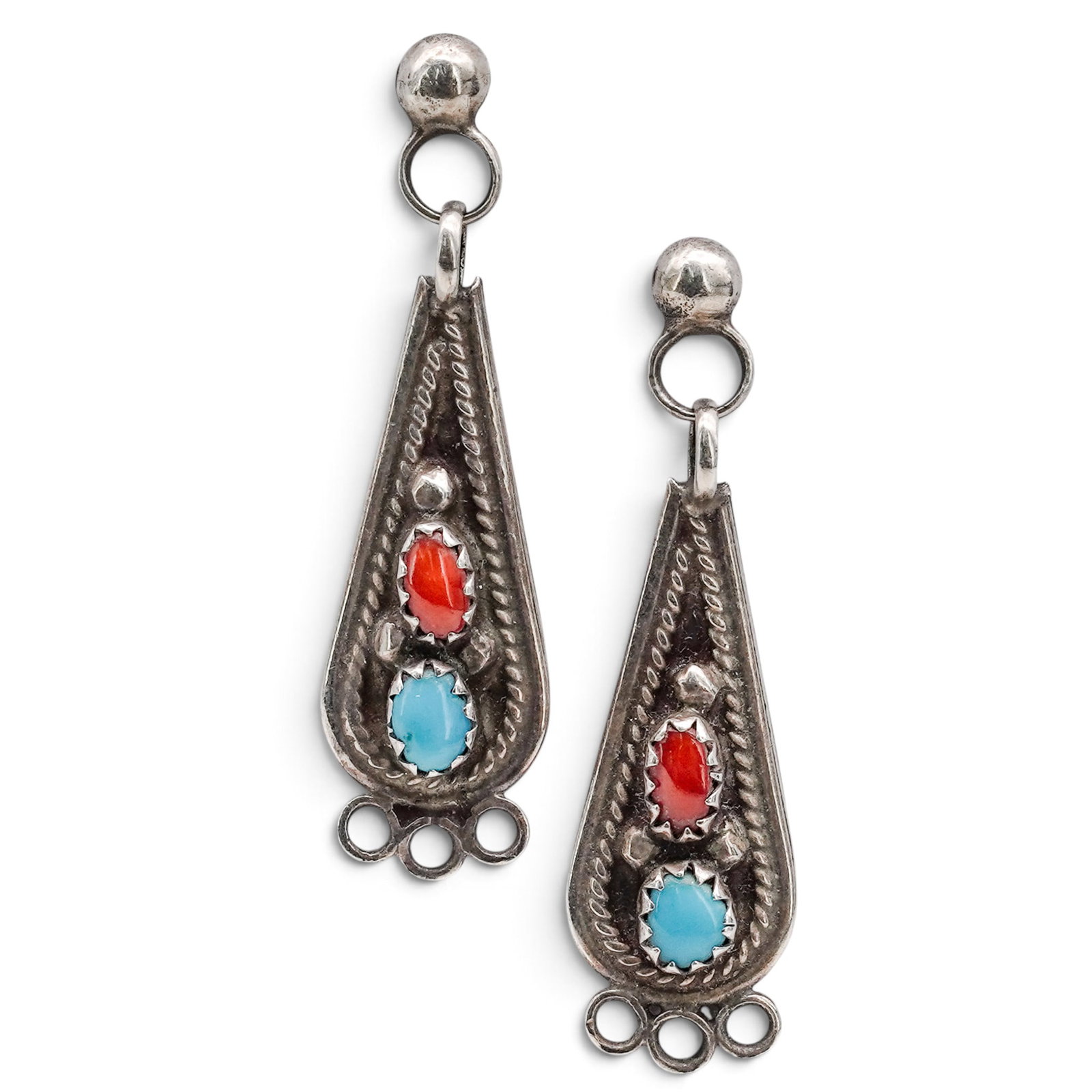 A Pair Of Navajo Sterling Silver, Turquoise, And Coral Teardrop Post Earrings: A pair of Navajo sterling silver, turquoise, and coral teardrop post earrings Late 20th Century Unmarked. Tested sterling silver. Teardrop-form post earrings set with turquoise and coral cabochons in 