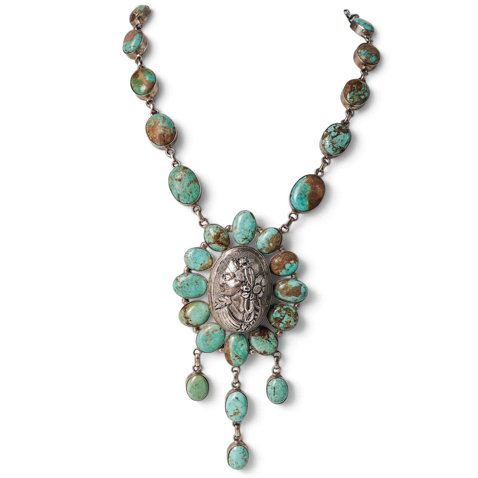 A Navajo Sterling Silver And Turquoise Cameo Necklace: A Navajo sterling silver and turquoise cameo necklace Late 20th century Stamped: I.W. / 925 A double-strand necklace of bezel-set turquoise cabochon links centered by a silver cameo portrait element, 