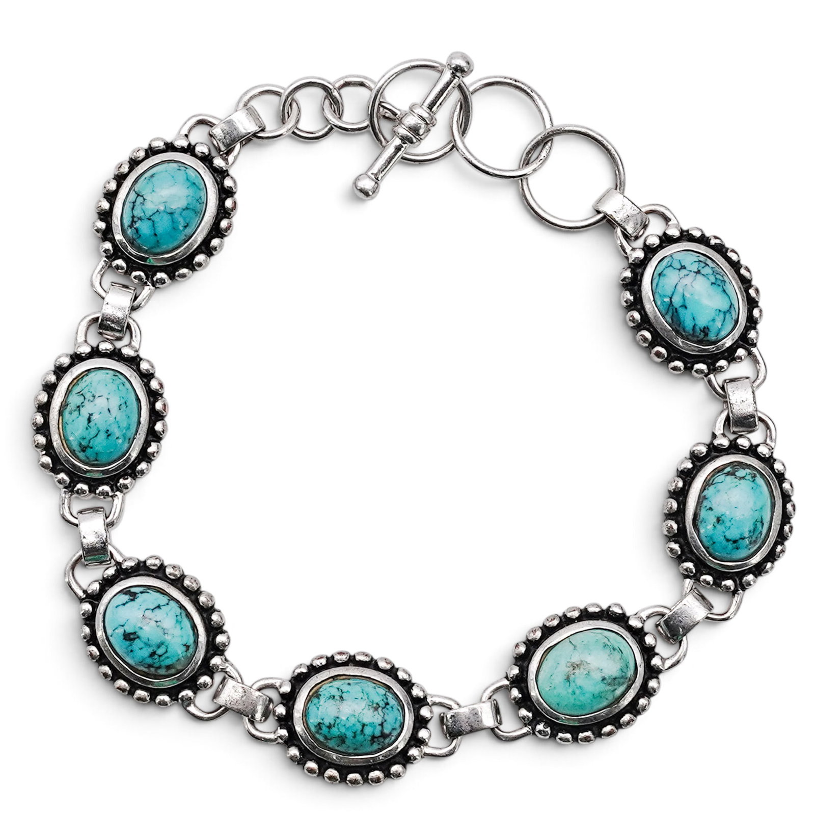 A Silver And Turquoise Link Bracelet: A silver and turquoise link bracelet Late 20th century Stamped: Unidentified hallmark. An articulated bracelet composed of oval bezel-set turquoise cabochons within silver tone beadwork borders, joine