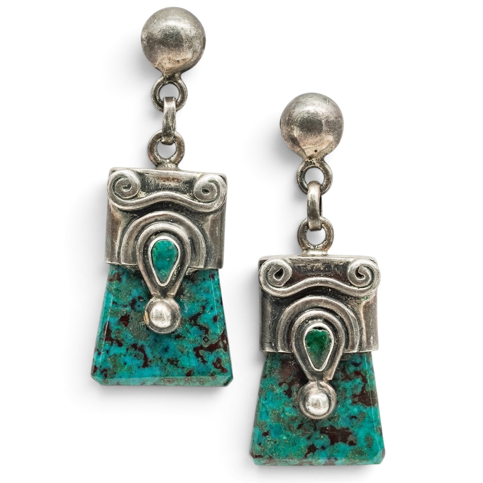 A Pair Of Sterling Silver, Turquoise, And Green Stone Drop Earrings: A pair of sterling silver, turquoise, and green stone drop earrings Late 20th century Stamped: VY / 925 Each post earring suspends a tapered turquoise slab partially capped with applied silver scrollw