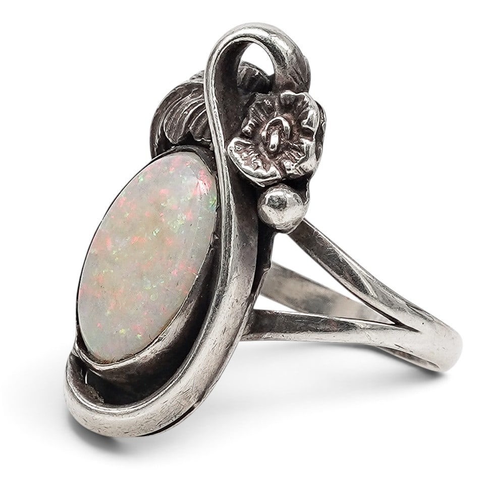 A Navajo Sterling Silver And Opal Foliate Ring (1 of 6)