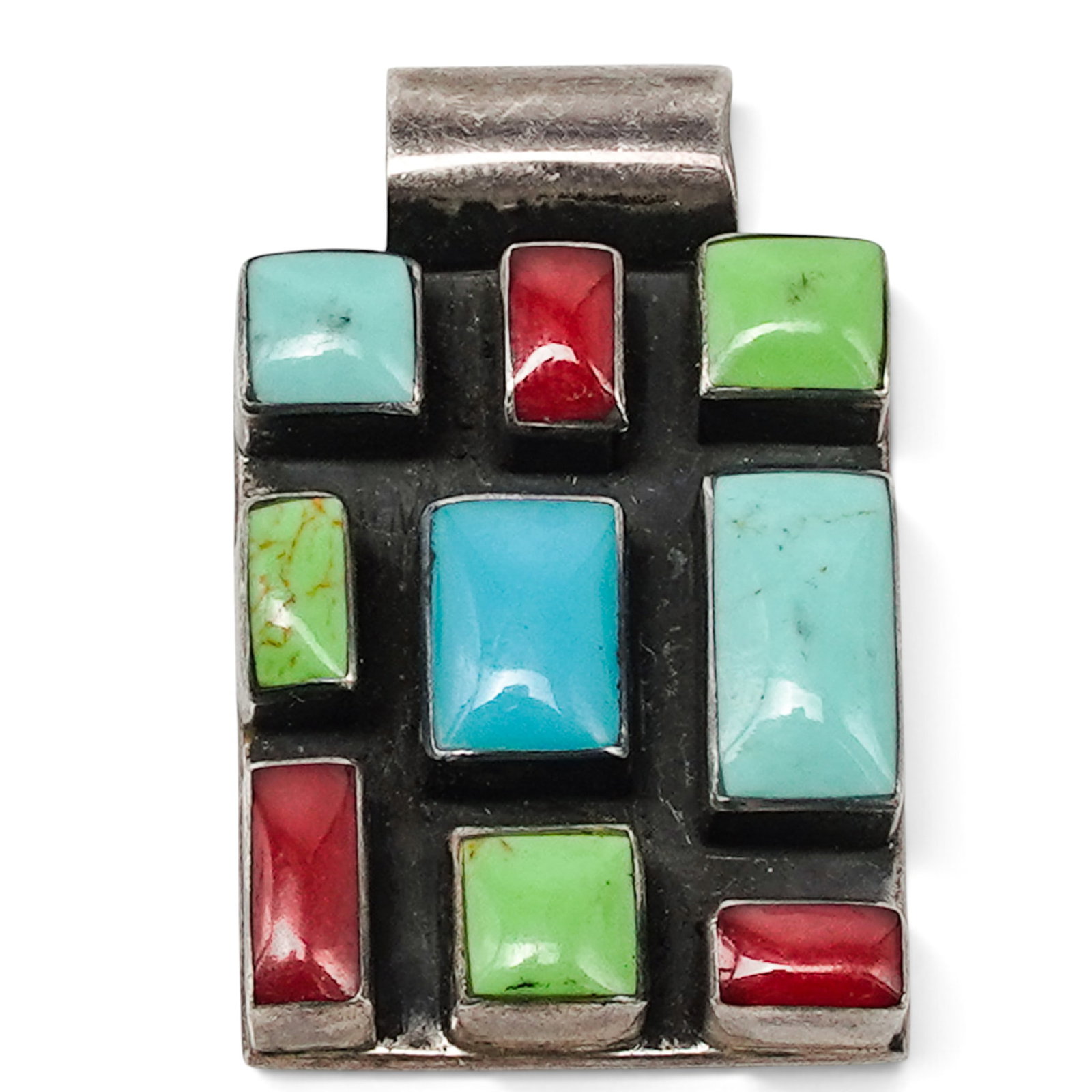 A HOB Mexican Sterling Silver And Multistone Geometric Pendant: A HOB Mexican sterling silver and multistone geometric pendant Late 20th century Stamped: HOB / Mexico / 925 A rectangular pendant with geometric arrangement of bezel-set turquoise, gaspeite, and cora