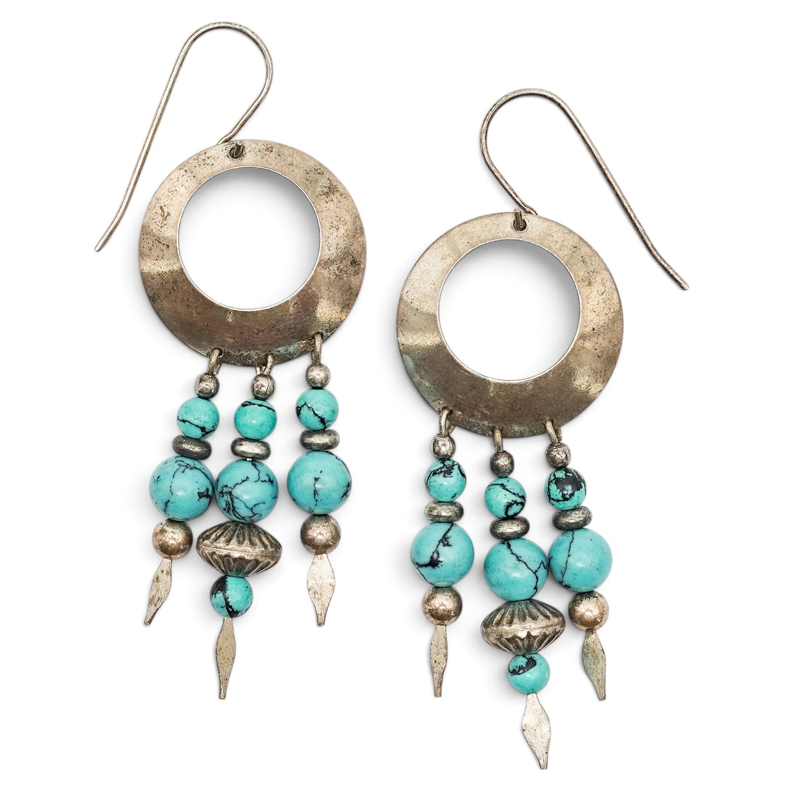 A Pair Of Navajo Sterling Silver And Turquoise Bead Fringe Earrings: A pair of Navajo sterling silver and turquoise bead fringe earrings Late 20th century Unmarked Tests for sterling. Each open circular earring suspends three articulated strands of turquoise beads with