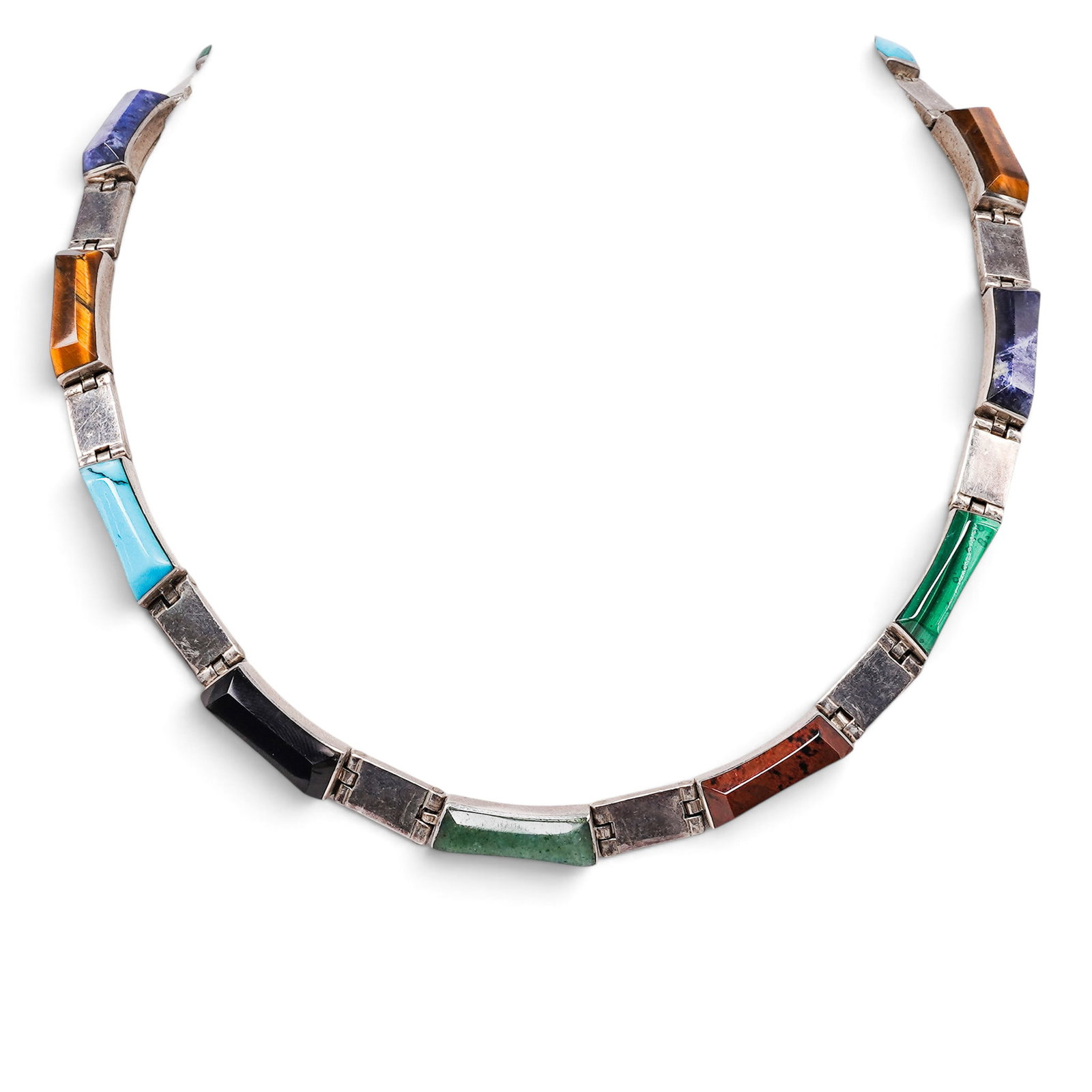 A Mexican Sterling Silver And Multistone Panel Link Necklace: A Mexican sterling silver and multistone panel link necklace Late 20th century Stamped: Mexico / 950 / MA-150 A necklace composed of articulated rectangular silver links, each set with polished multis