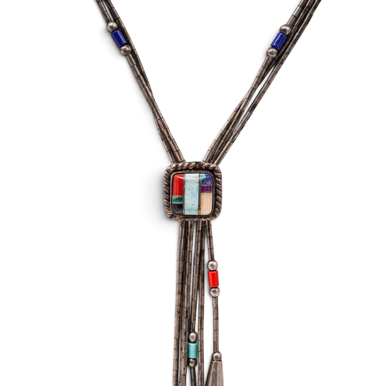 A Navajo Sterling Silver And Multistone Liquid Silver Lariat Necklace: A Navajo sterling silver and multistone liquid silver lariat necklace Late 20th century Stamped: Sterling. A liquid silver lariat necklace composed of multiple strands of fine silver tube beads, accen
