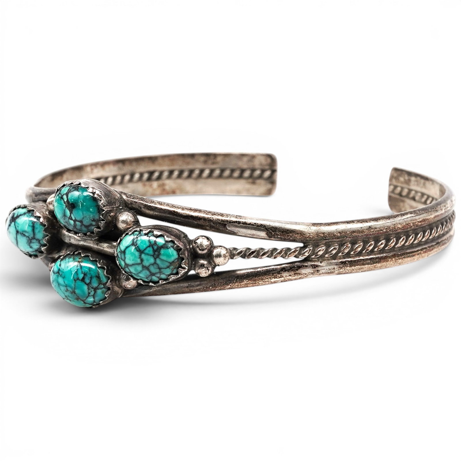 A Navajo Sterling Silver And Turquoise Four Stone Cuff Bracelet (1 of 6)