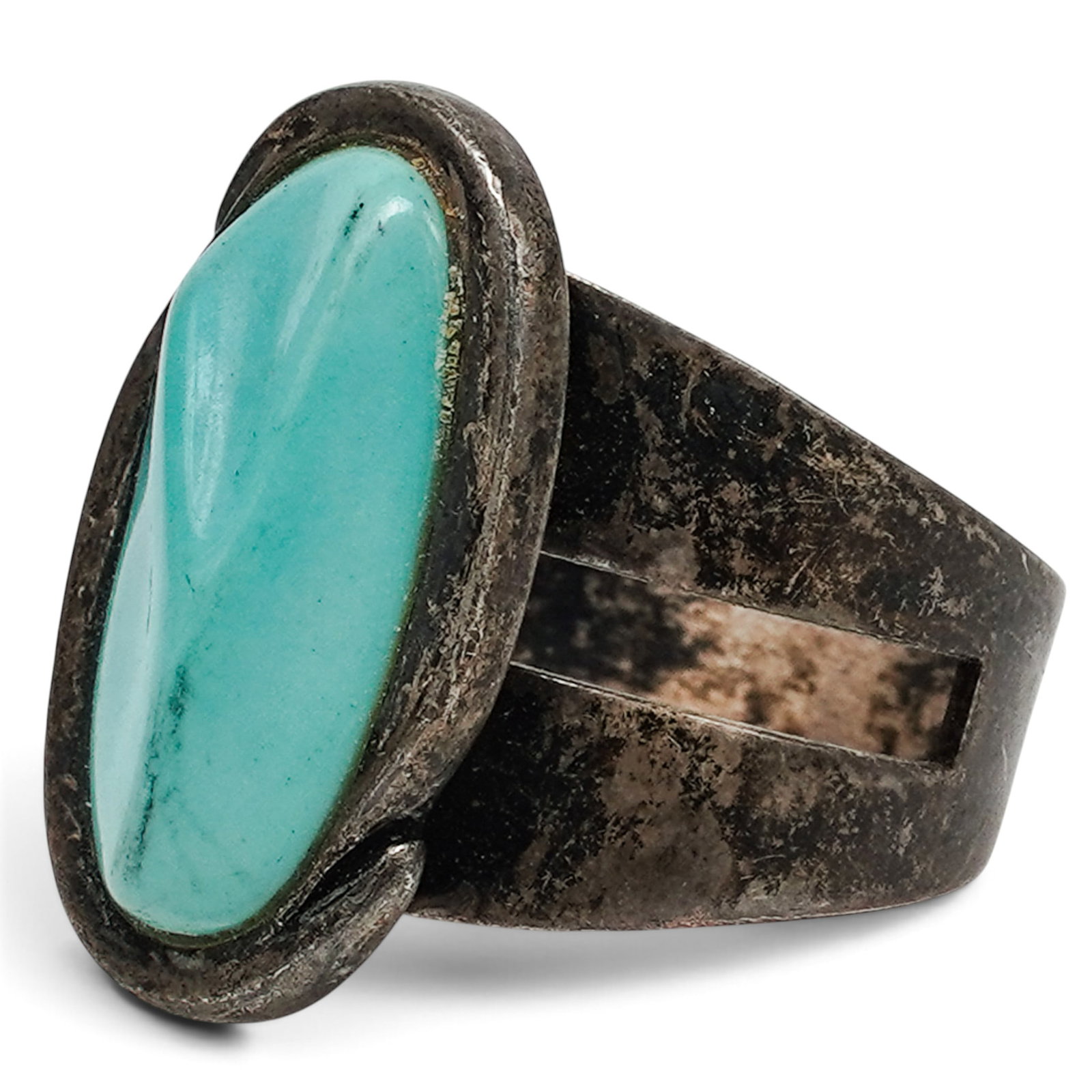 A Desert Rose Trading Southwestern Sterling Silver And Turquoise Split Shank Ring: A Desert Rose Trading Southwestern sterling silver and turquoise split shank ring Late 20th Century Stamped: DTR / .925 A ring set with an oval turquoise cabochon in a serrated bezel, with split shank