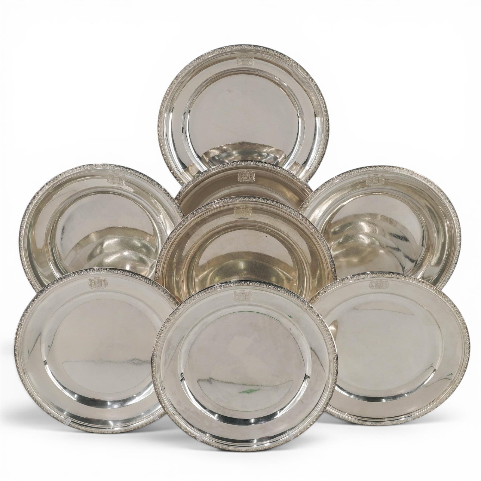 (8 pc) Christofle Sterling Silver Coat Of Arms Charger Set: (8 pc) Christofle Sterling Silver Coat Of Arms Charger Set 20th century, French Set of 8 christfole chargers, stamped the presence of the Lozenge-shaped master mark combined with the plain "CHISTOFLE"