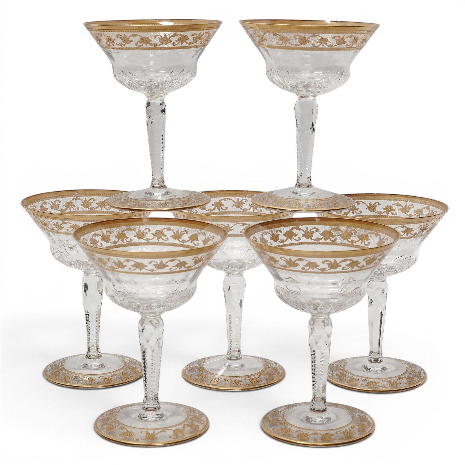 (7pc) St.Louis "Thistle Gold" Crystal Champagne Coupes: (7pc) St.Louis "Thistle Gold" Crystal Champagne Coupes 20th Cent., French Set of seven crystal champagne coupes by Cristallerie Saint-Louis in the Thistle Gold pattern. Each features a mouth-blown and