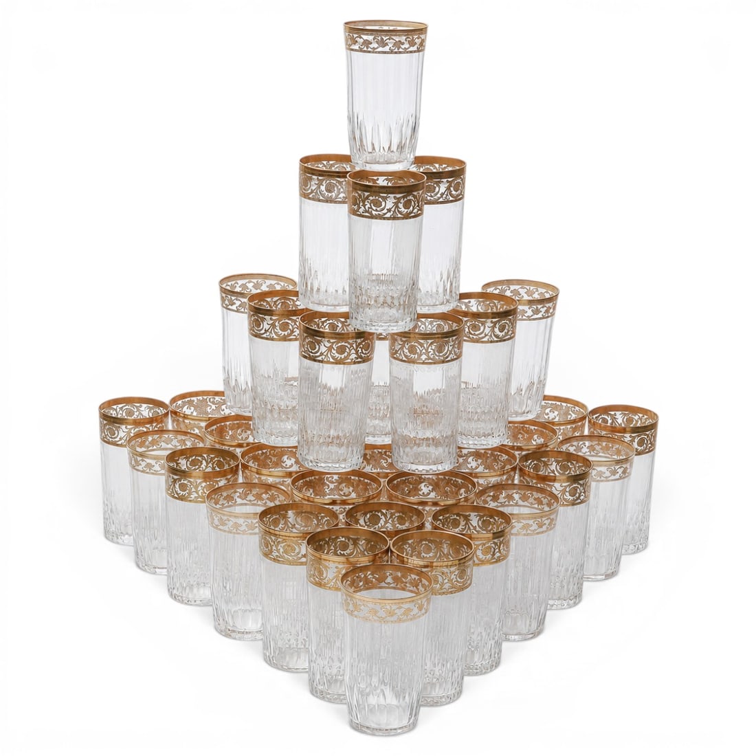(39pc) St. Louis Gilt Crystal Highball Tumbler Set: (39pc) St. Louis Gilt Crystal Highball Tumbler Set 20th Cent., French Highball Tumblers, each tumbler is crafted from heavy, high-brilliance crystal and features an intricate 24-karat gold-gilded frie
