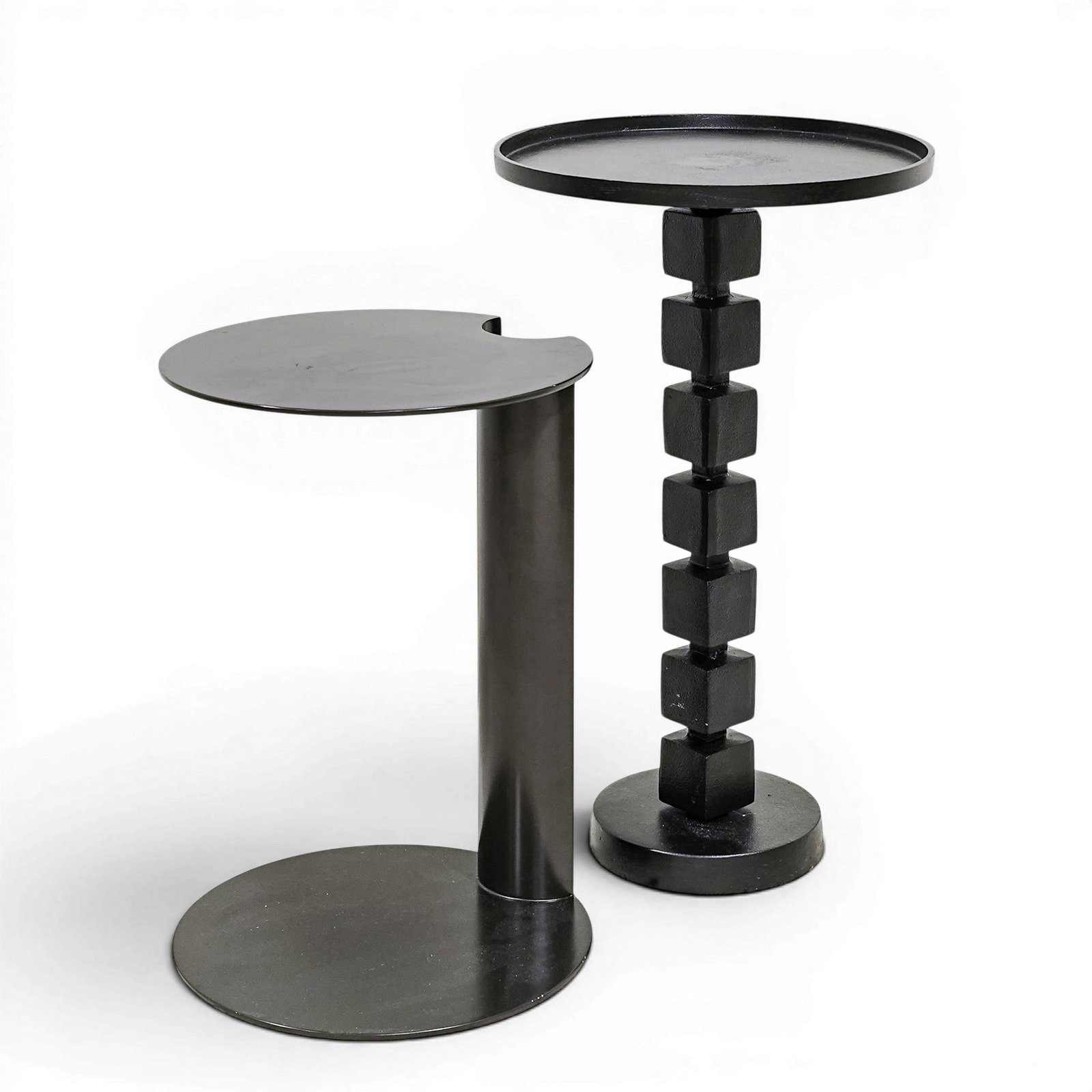 Pair of Artefacto Contemporary Black Side Tables: Pair of Artefacto Contemporary Black Side Tables Early 21st Century, Brazil Pair of contemporary side tables by Artefacto, each featuring a distinctive sculptural silhouette in a matte black finish.