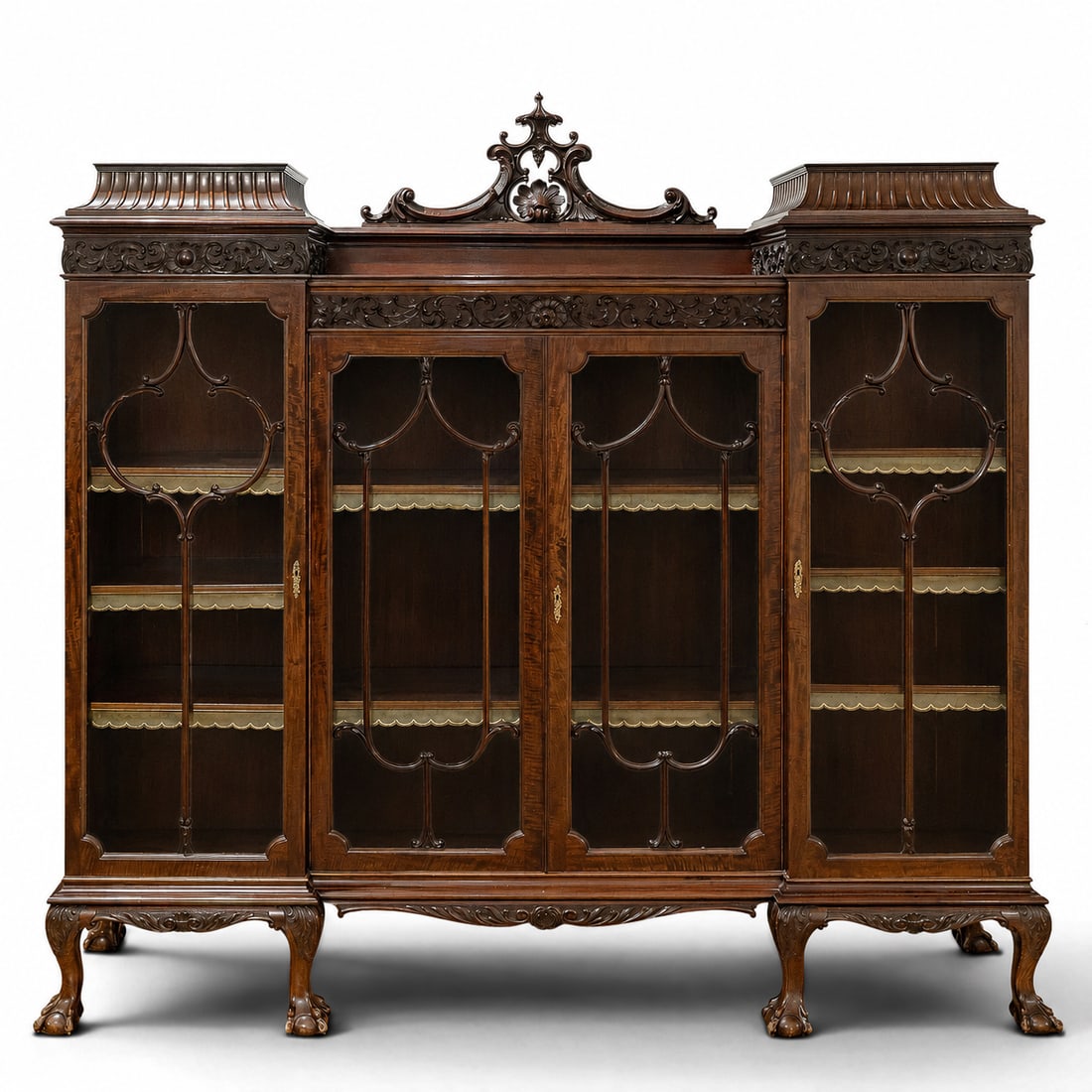 Antique Waring & Gillow Chippendale Style Breakfront Cabinet: Antique Waring & Gillow Chippendale Style Breakfront Cabinet Late 19th Century, England Antique breakfront display cabinet by Waring & Gillow, executed in the Chippendale Revival taste. Crafted in