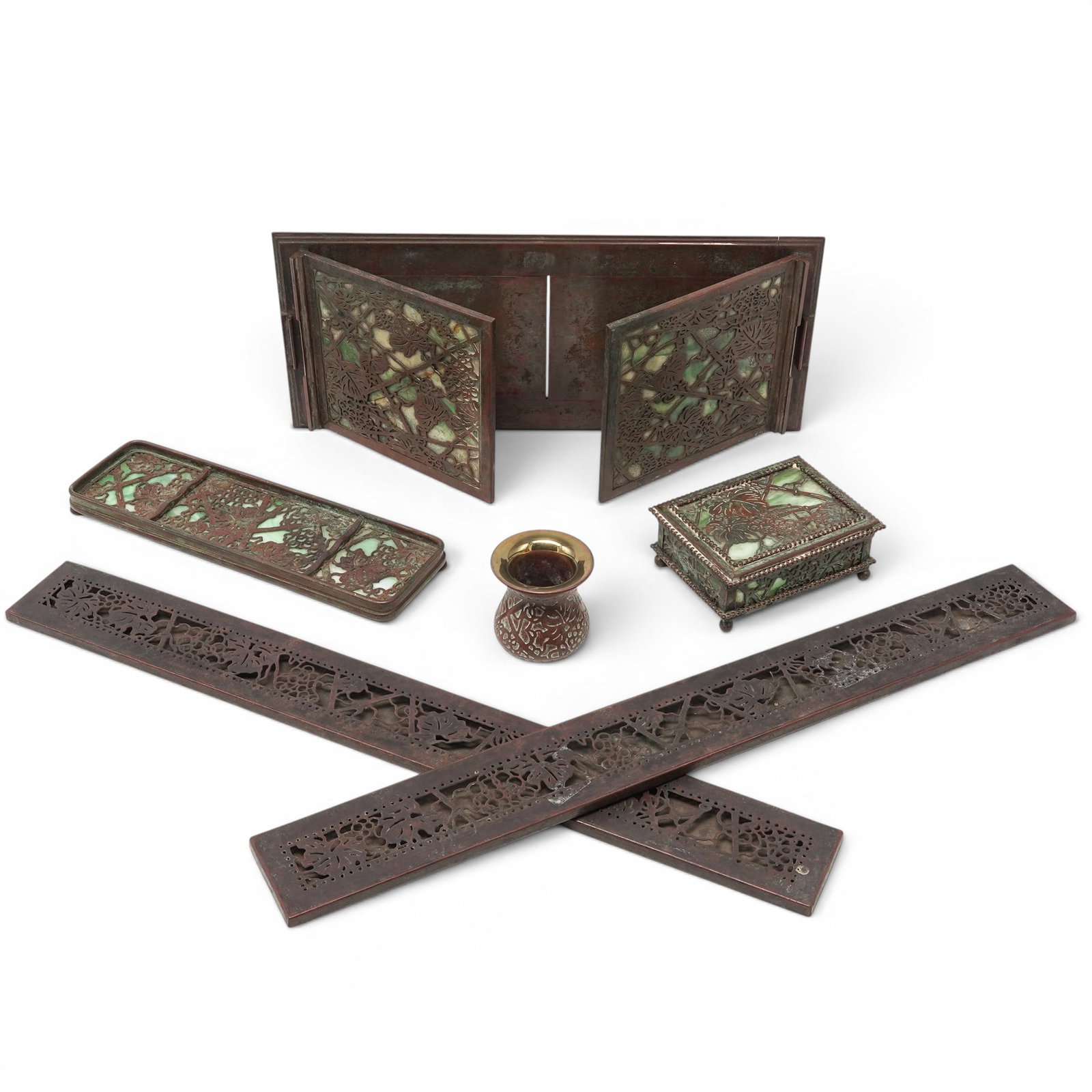(6 pcs) Tiffany Studios "Grapevine" Bronze & Slag Glass Desk Set: (6 pcs) Tiffany Studios "Grapevine" Bronze & Slag Glass Desk Set Early 20th century, American Fourteen piece bronze and slag glass Tiffany desk set in the "grapevine" pattern. (2) Blotter ends, "grape