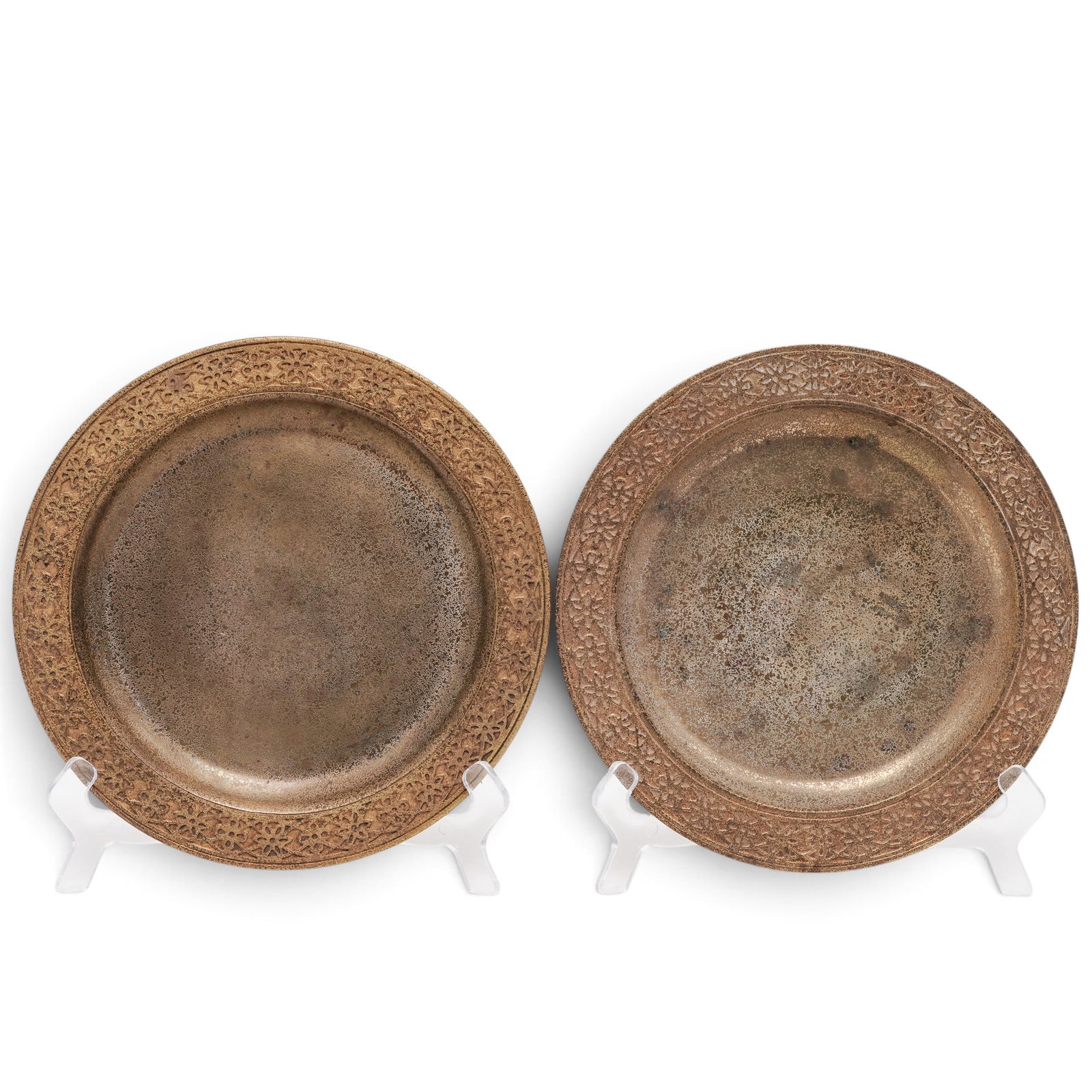 Pair of Tiffany Studios Bronze Plates: Pair of Tiffany Studios Bronze Plates c. 1900-1920, USA These antique Tiffany Studios bronze doré plates feature a distinct decorative border and signature gold gilded finish. Material: Gilt Bronze (