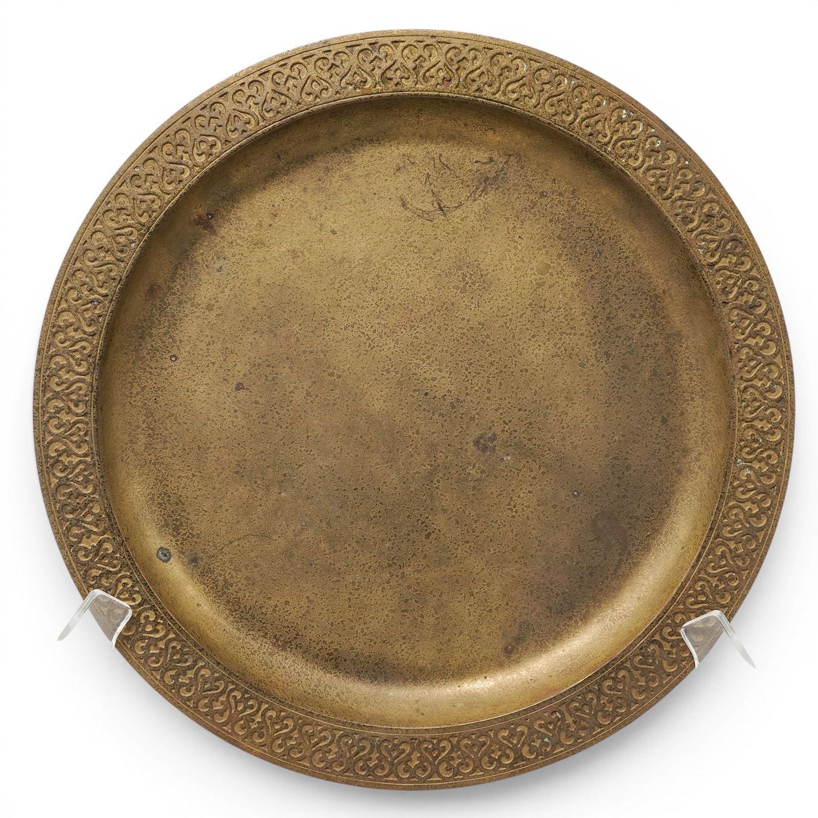 Tiffany Studios Gilt Bronze Charger: Tiffany Studios Gilt Bronze Charger Early 20th Cent., American The dish is famously known for its Moorish scroll band pattern, which features a detailed, repetitive relief scrollwork motif running