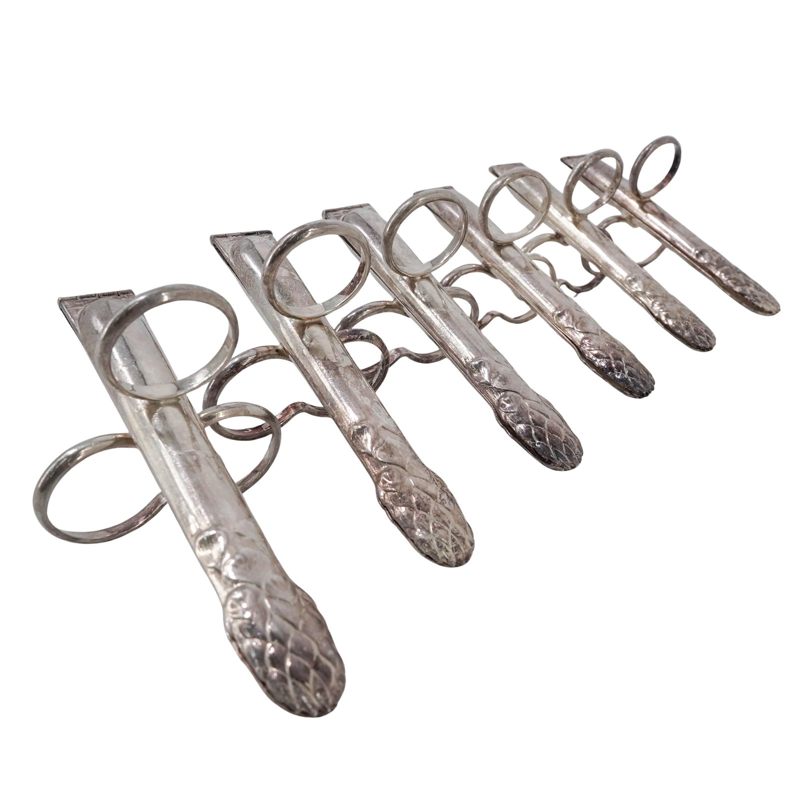 (6 pcs) Christofle Silver Plated Asparagus Tongs: (6 pcs) Christofle Silver Plated Asparagus Tongs Late 19th-early 20th century, French A set of six Christofle silver plated asparagus finger tongs. L 4.75" x W 2"