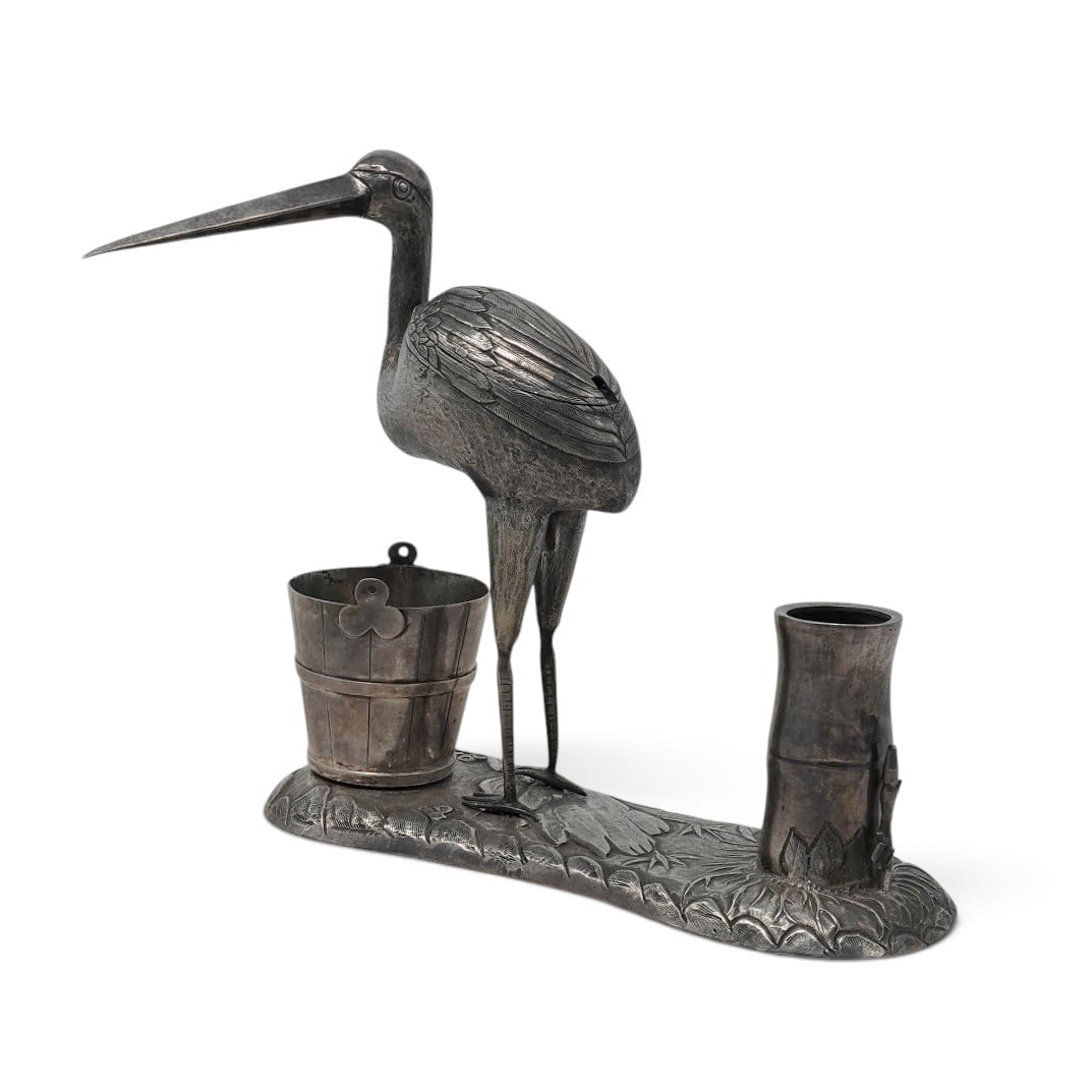 Chinese Silver Crane Desk Set: Chinese Silver Crane Desk Set 19th century, Chinese Chinese silver crane with long beak and finely engraved feathers. Hinged back reveals a compartment. mounted on a silver stand with bamboo and bucke