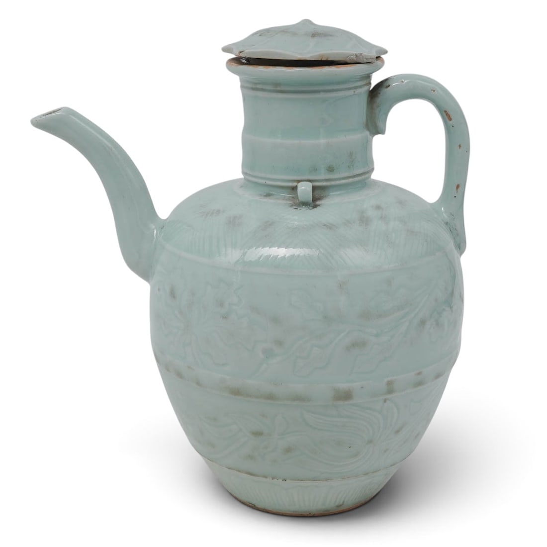 Antique Qingbai Porcelain Floral Ewer: Antique Qingbai Porcelain Floral Ewer Possibly Song dynasty, Chinese A "qingbai" ware porcelain floral ewer possibly from the Song Dynasty. Ewer with incised bands of floral designs with bottom band