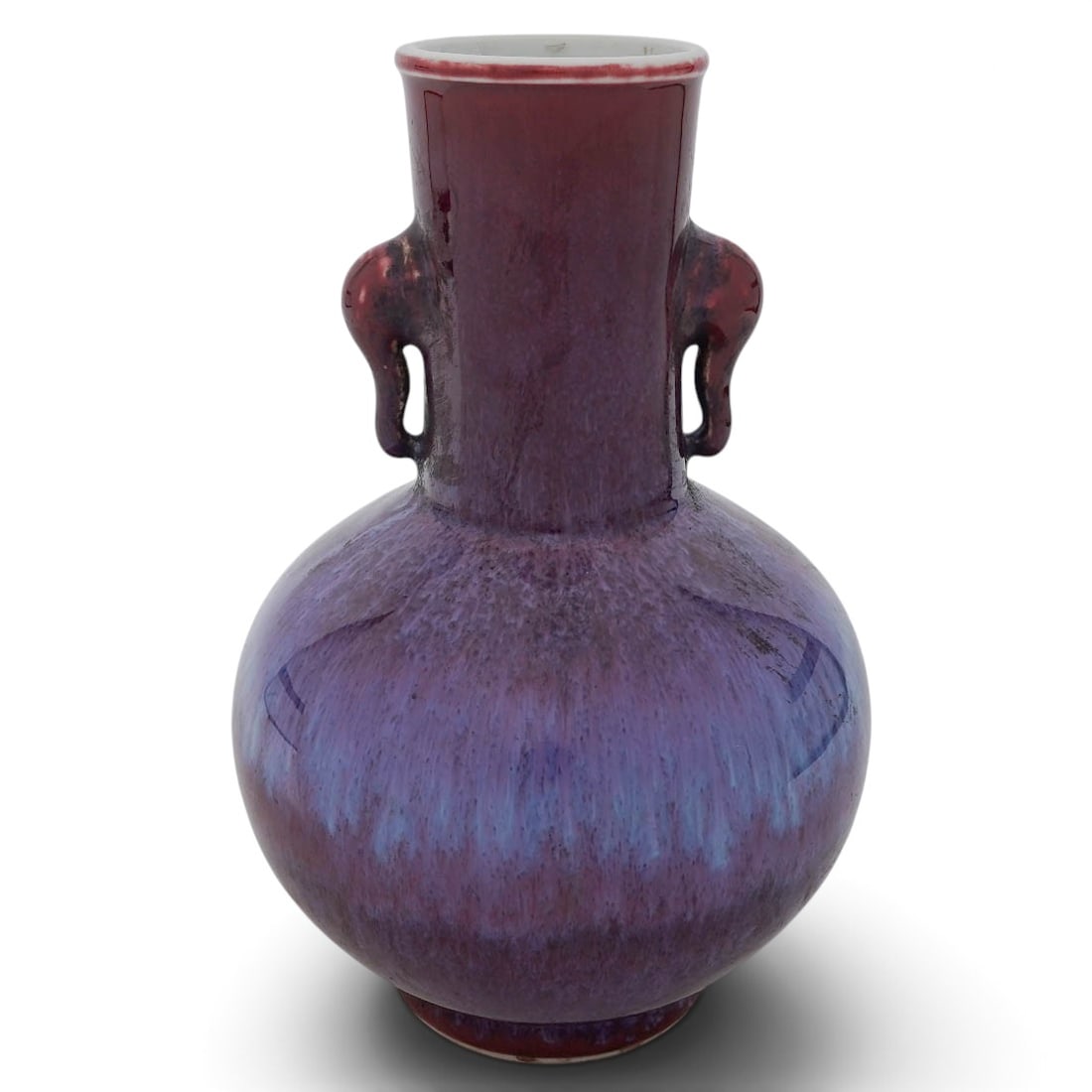 Chinese Flambe Vase w/ Elephant Head Handles: Chinese Flambe Vase w/ Elephant Head Handles Qing Dynasty, Chinese A Chinese Qing Dynasty flambe glazed vase, ranging from deep red to blue and purple at shoulders of vase, the interior and foot both