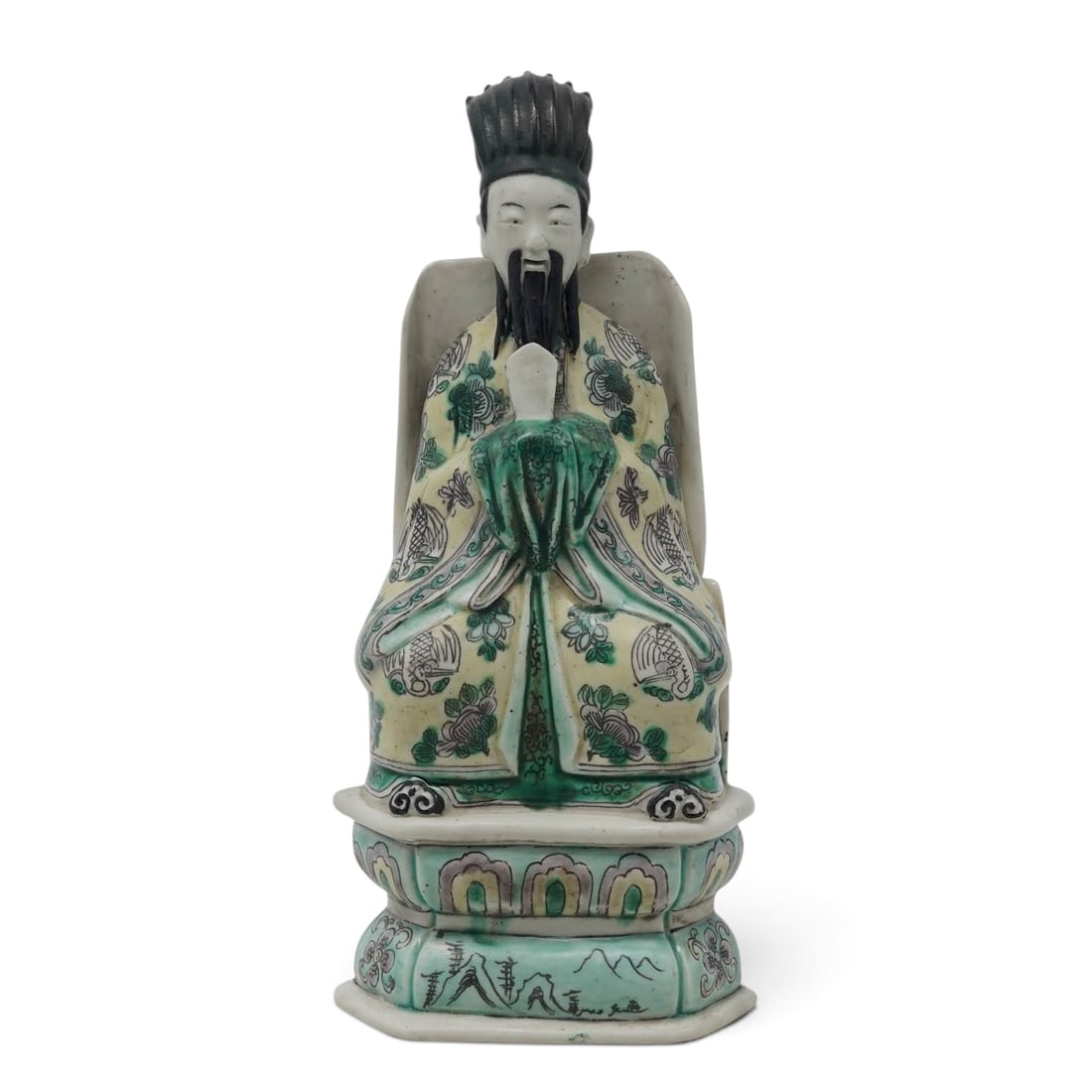 Chinese Famille Verte Porcelain Court Official: Chinese Famille Verte Porcelain Court Official 19th century, Chinese Seated court official with large Ming style hat seated on throne with lotus petal design stand with details to eyes, mouth, and nos