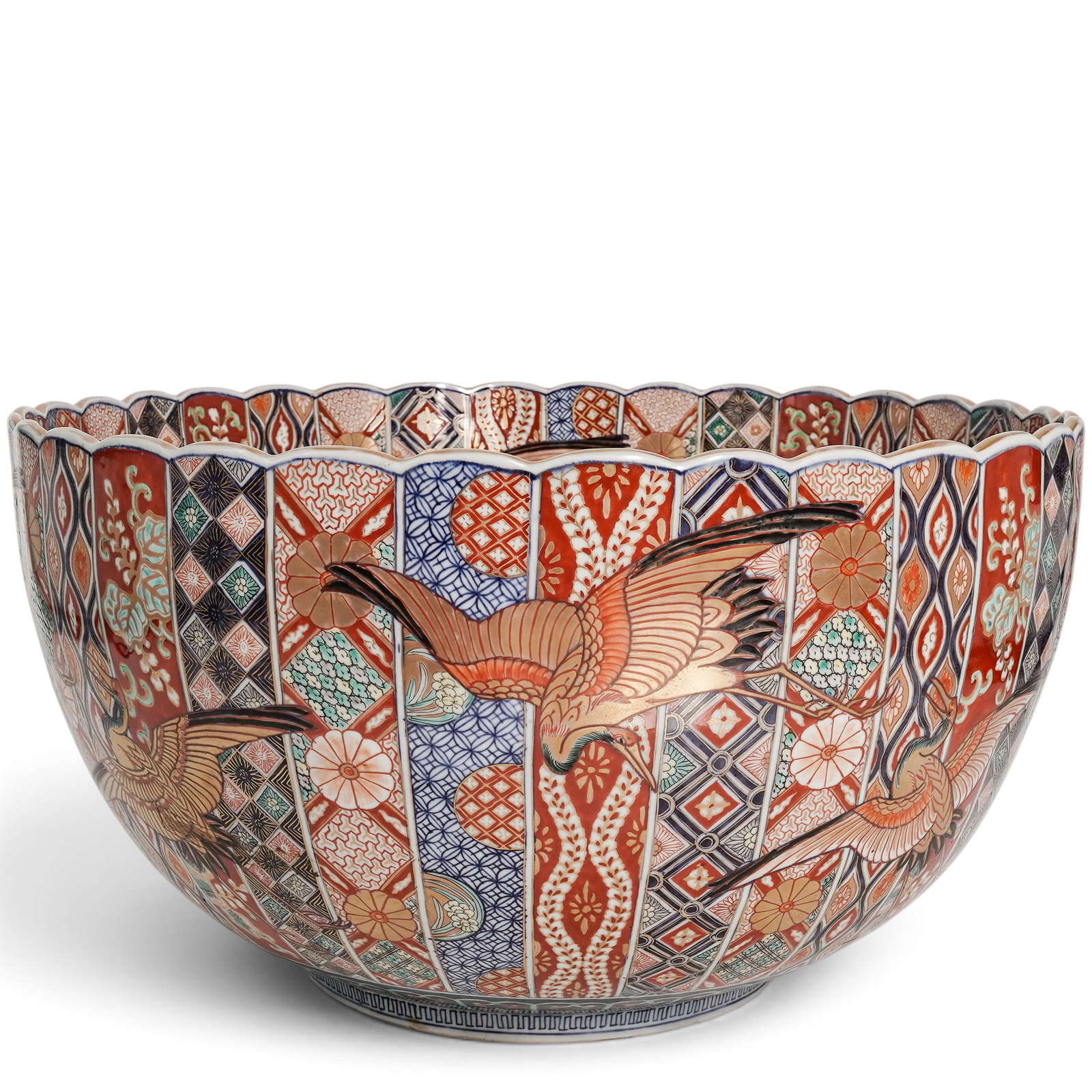 Large Impressive Ribbed Imari Centerpiece Bowl: Large Impressive Ribbed Imari Centerpiece Bowl 19th Century, Japan Meiji Period. Bottom signed with flower logo. The shape of this impressive large Imari bowl is flower shape with gilt rims and ribbed