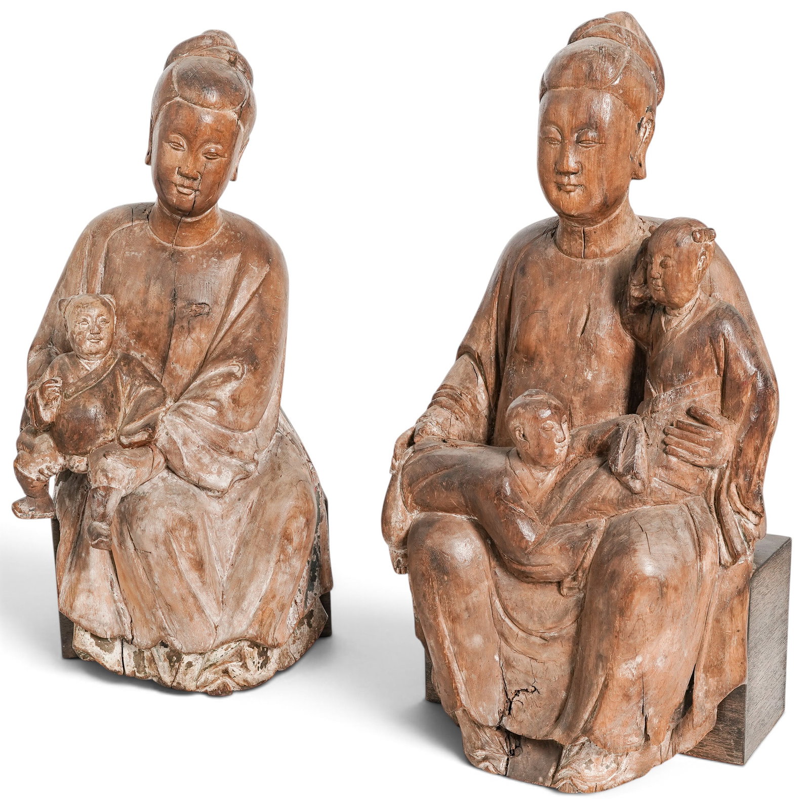 Pair Chinese Late Ming Polychrome Songzi Guanyin w/ Children: Pair Chinese Late Ming Polychrome Songzi Guanyin w/ Children Late Ming period (16th-17th century), Chinese Matched pair of seated Songzi Guanyin women holding boys on their knees with traces of polych