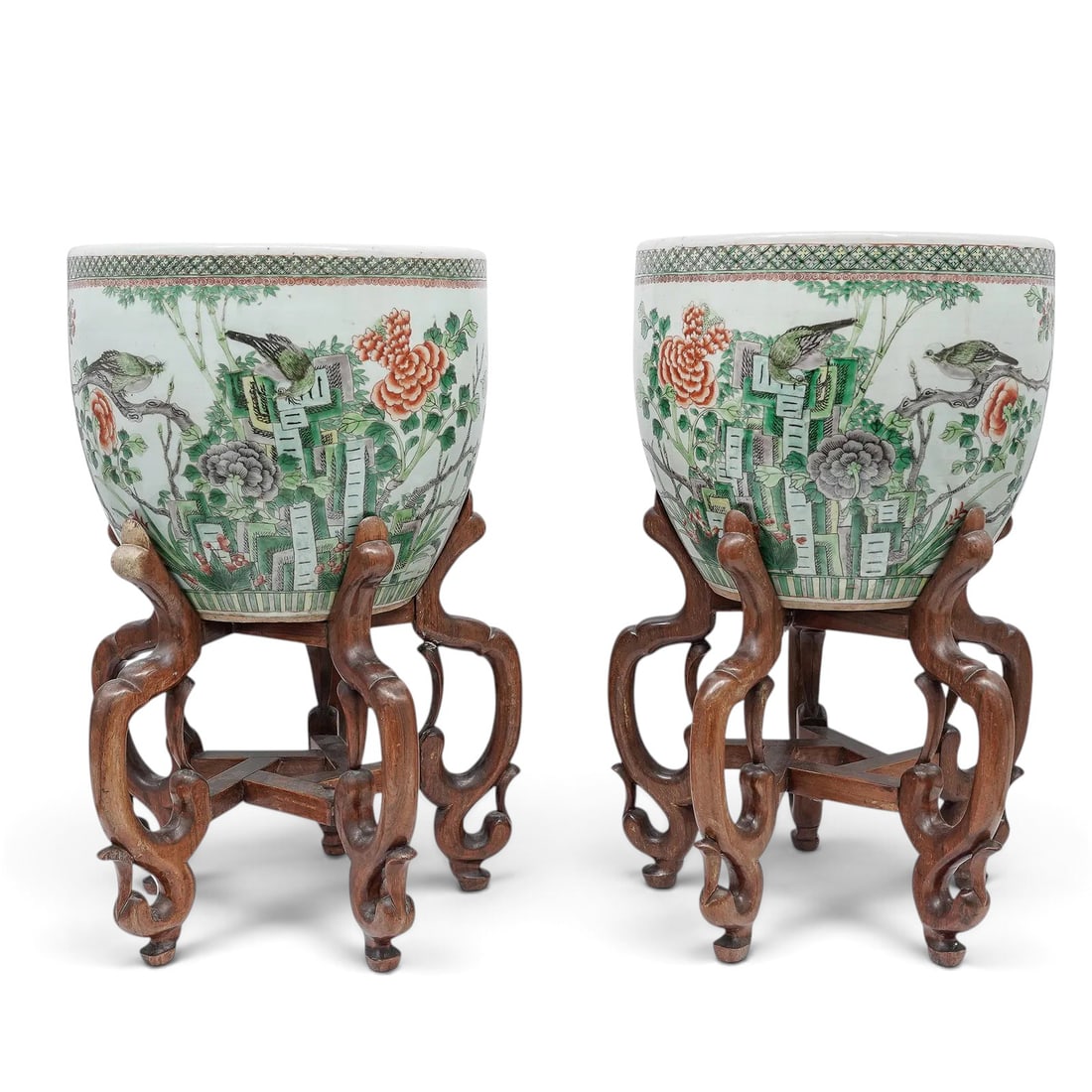 Matched Pair of Famille Verte Chinese Porcelain Jardinieres: Matched Pair of Famille Verte Chinese Porcelain Jardinieres Late Ching, 19th Century Matched pair of Famille Verte Chinese porcelain jardinieres with nicely carved hardwood stands. This fine pair of p