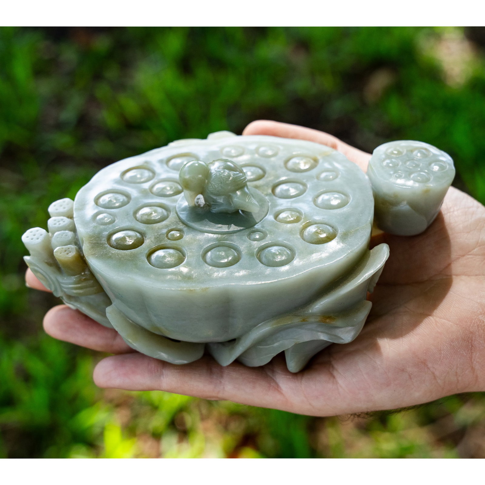 18th Century Chinese Jade Lotus Water Pot: 18th Century Chinese Jade Lotus Water Pot 17th-18th century, Chinese Chinese carved celadon jade water pot crafted as several parts of a lotus - including seed pods, flower, and leaf - bound by a ribb