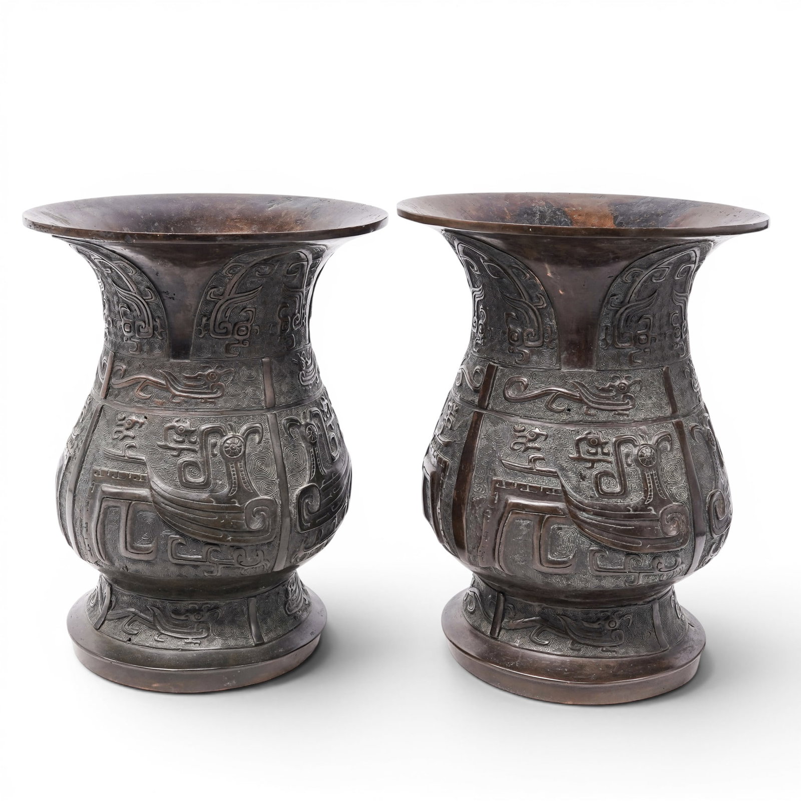 Pair Chinese Archaic Style Bronze Hu Shaped Vases: Pair Chinese Archaic Style Bronze Hu Shaped Vases Late Ming- early Qing dynasty, Chinese This heavily cast pair of archaic design with stylized birds, and a background with fine geometric designs. The
