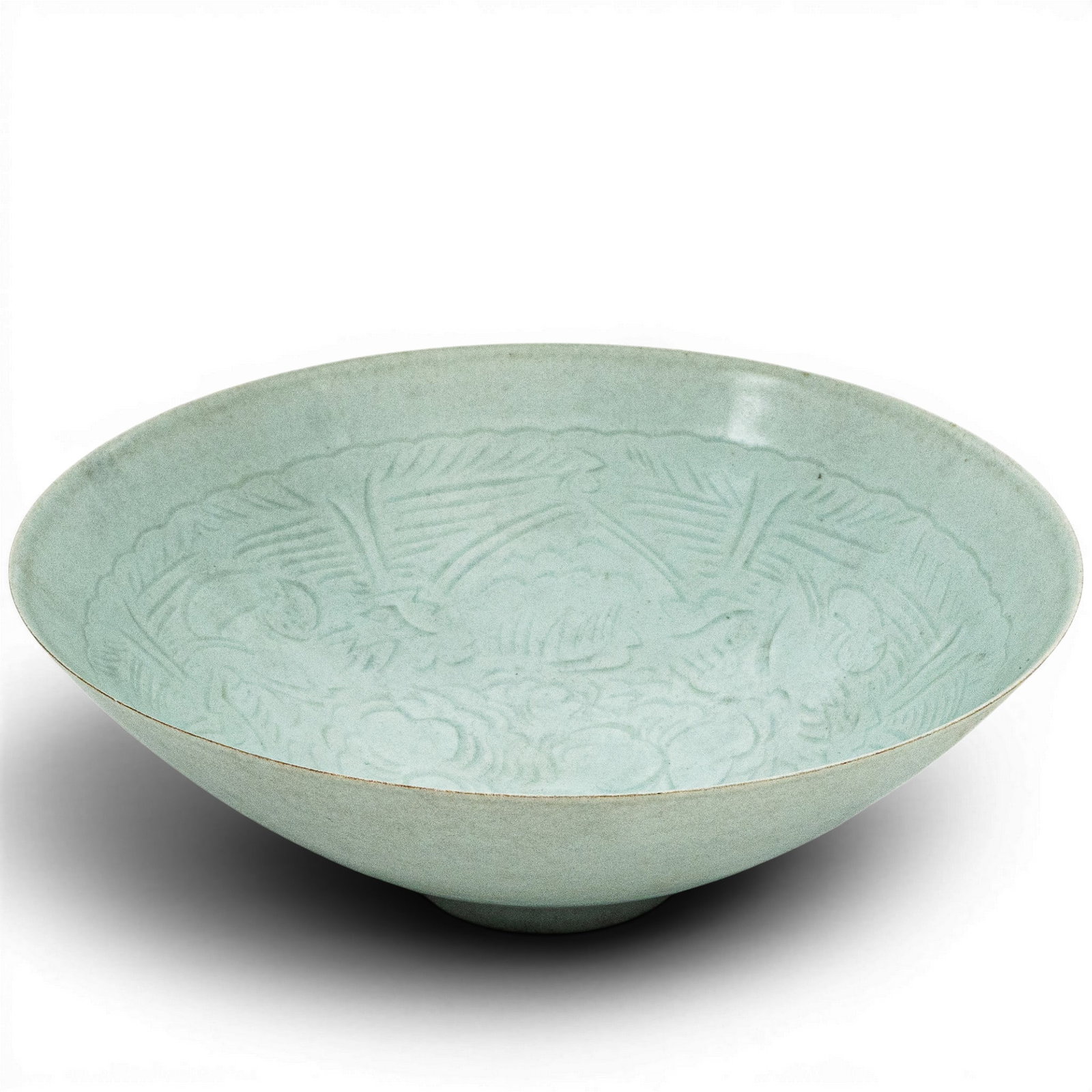 Chinese Song Dynasty Carved Qinbai Boy's Bowl: Chinese Song Dynasty Carved Qinbai Boy's Bowl Song Dynasty, Chinese This blue tinged glaze bowl with carved design of boys to the interior on a raised foot rim with underglazed bottom. Collection numb