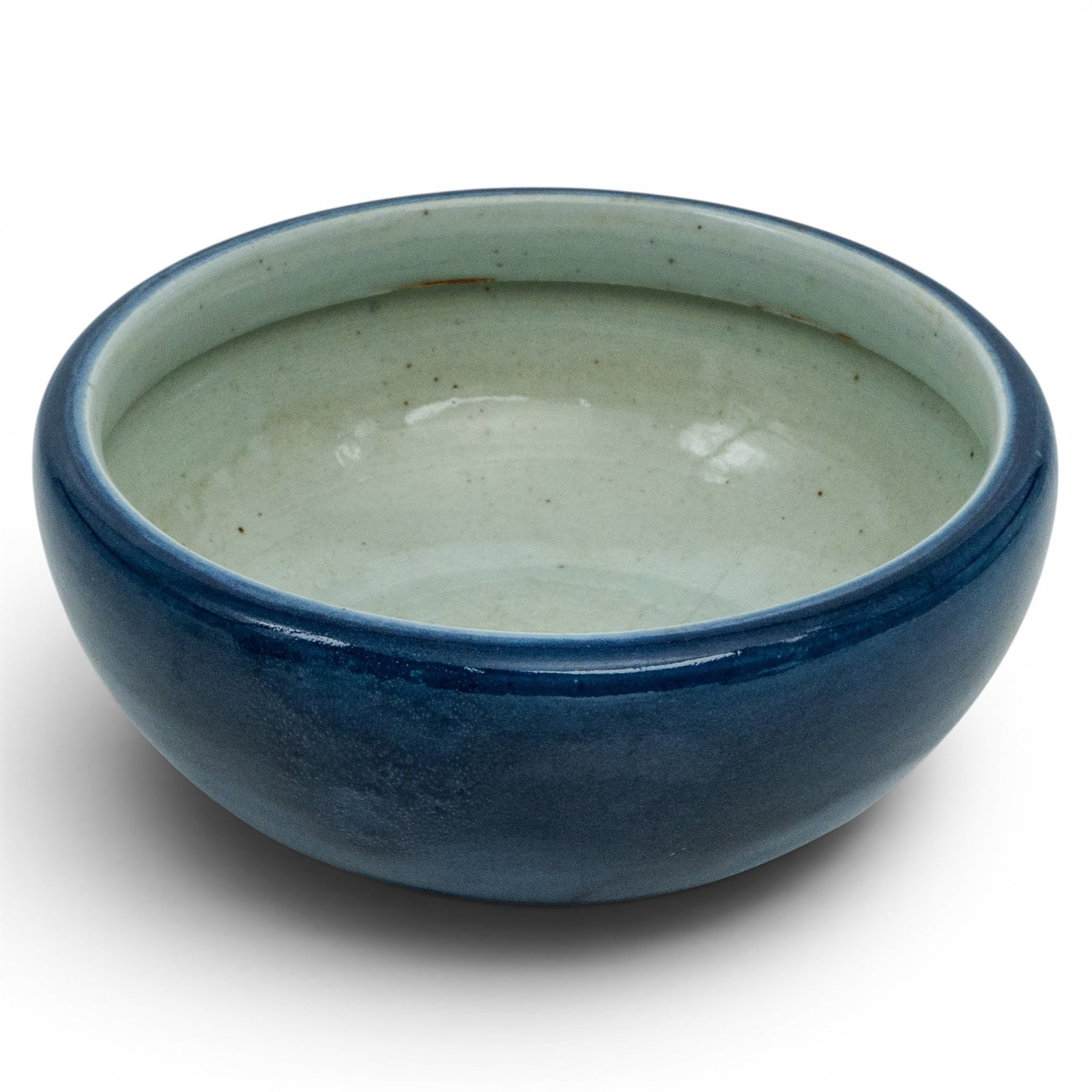 Chinese Porcelain Monochrome Blue Glazed Bowl: Chinese Porcelain Monochrome Blue Glazed Bowl 19th century, Chinese Chinese porcelain monochrome blue glazed bowl. Exterior glazed with a deep blue glaze and the interior is glazed white. Foot is ungl