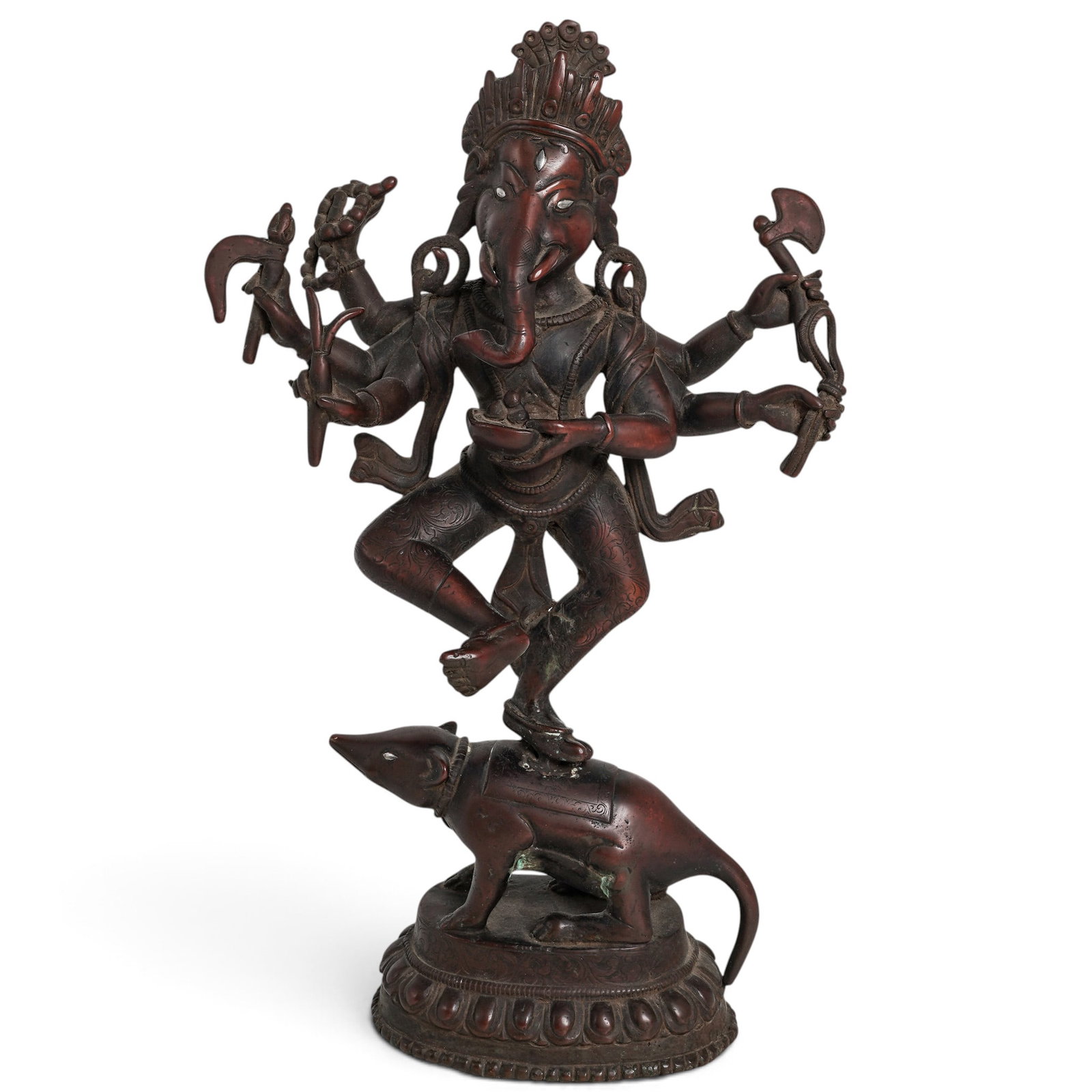 Indian Bronze Ganesha Standing on Rat: Indian Bronze Ganesha Standing on Rat Mid 20th century, Indian This mutli-armed Ganesha holds ritual instruments, silver inlay eye detail. Finely engraved with a reddish copper patina. The rat is also