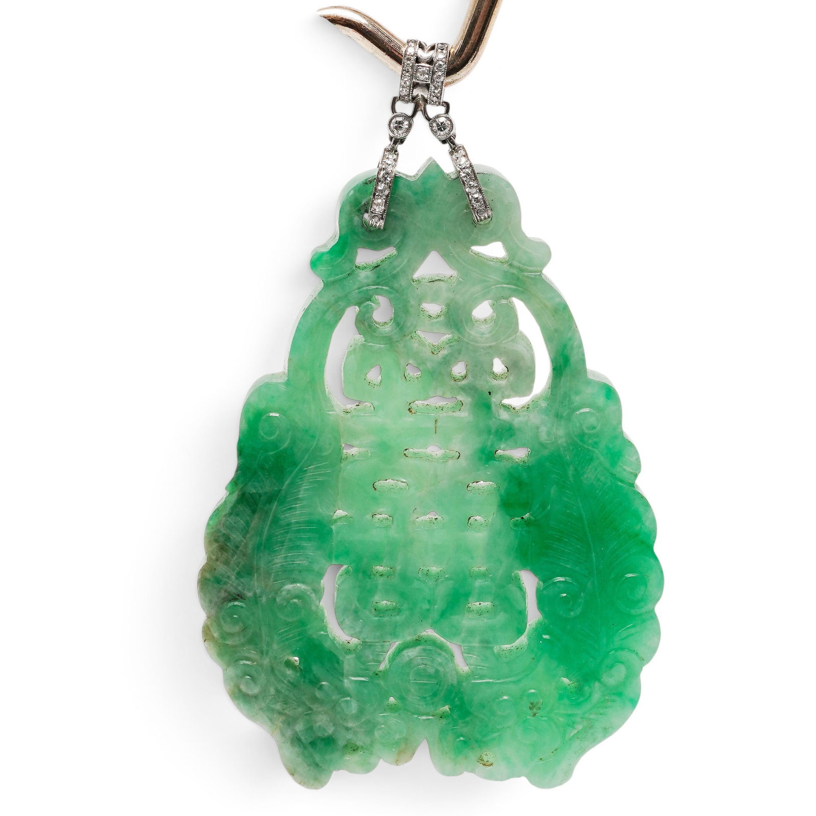Platinum & Diamond Jadeite Mounted Pendant: Platinum & Diamond Jadeite Mounted Pendant Early 20th century, Chinese Art Deco period mounted jadeite pendant with stylized dragons and double happiness characters carved on both sides with pierced o