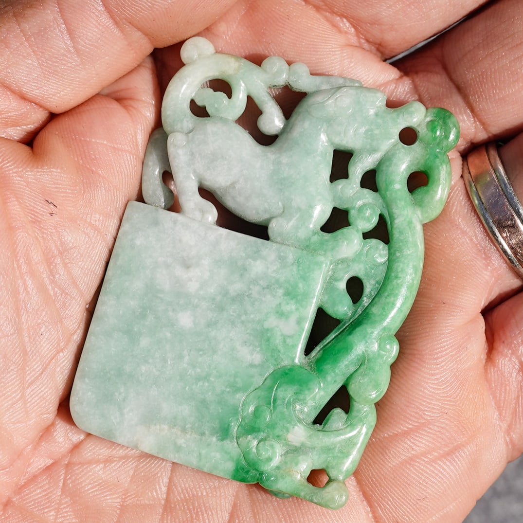 Chinese Carved Jadeite Pendant w/ Chinlong Dragons and Tablet Shape: Chinese Carved Jadeite Pendant w/ Chinlong Dragons and Tablet Shape Mid 20th century, Chinese One Chinlong dragon is standing on a seal shape and the other is carved to the side with bright apple gree