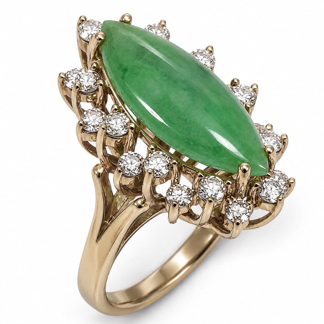 Jadeite and Diamond 14k Gold Ring: Jadeite and Diamond 14k Gold Ring 20th century, Chinese The jadeite cabochon is grade A jadeite, surrounded by twenty diamonds clustered in two layers. Size 4-5. Weight: 5.93 g/ 3.81 dwt. L 22.7 mm x 