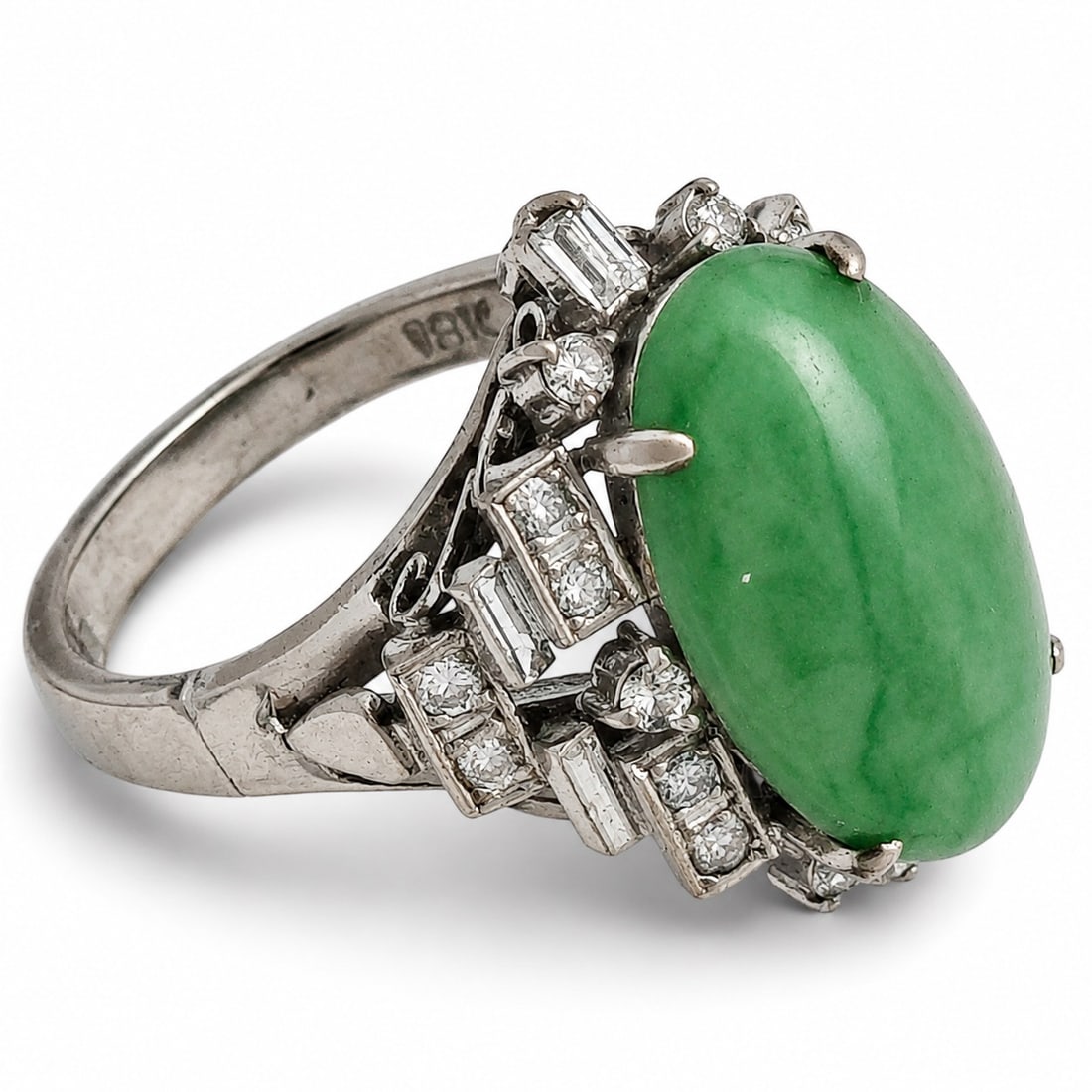 Chinese Jadeite, Diamond & 18k White Gold Ring: Chinese Jadeite, Diamond & 18k White Gold Ring 20th century, Chinese A Chinese 18k white gold ring with central oval jadeite cabochon surrounded by twenty inset diamonds. Marked "18k" on ring. Size 4-