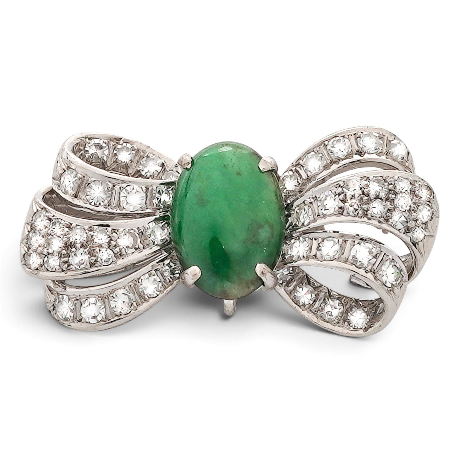 Imperial Jadeite, 14k White Gold, and Diamond Bow Brooch, Stamped Trio: Imperial Jadeite, 14k White Gold, and Diamond Bow Brooch, Stamped Trio 20th century, Chinese A 14k white gold bow shaped brooch with central Imperial jadeite cabochon surrounded by inset diamonds. Mar