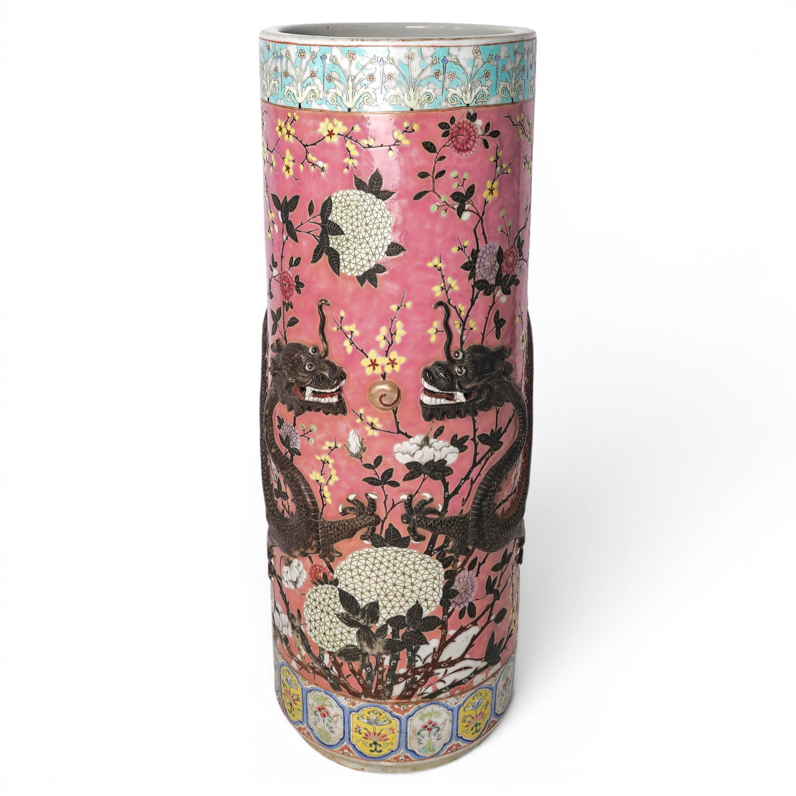 Chinese Famille Rose Porcelain w/ Raised Dragon & Flaming Pearl Design: Chinese Famille Rose Porcelain w/ Raised Dragon & Flaming Pearl Design Qing dynasty, Chinese Chinese famille rose porcelain umbrella stand with a raised dragon and flaming pearl design. Pink backgroun
