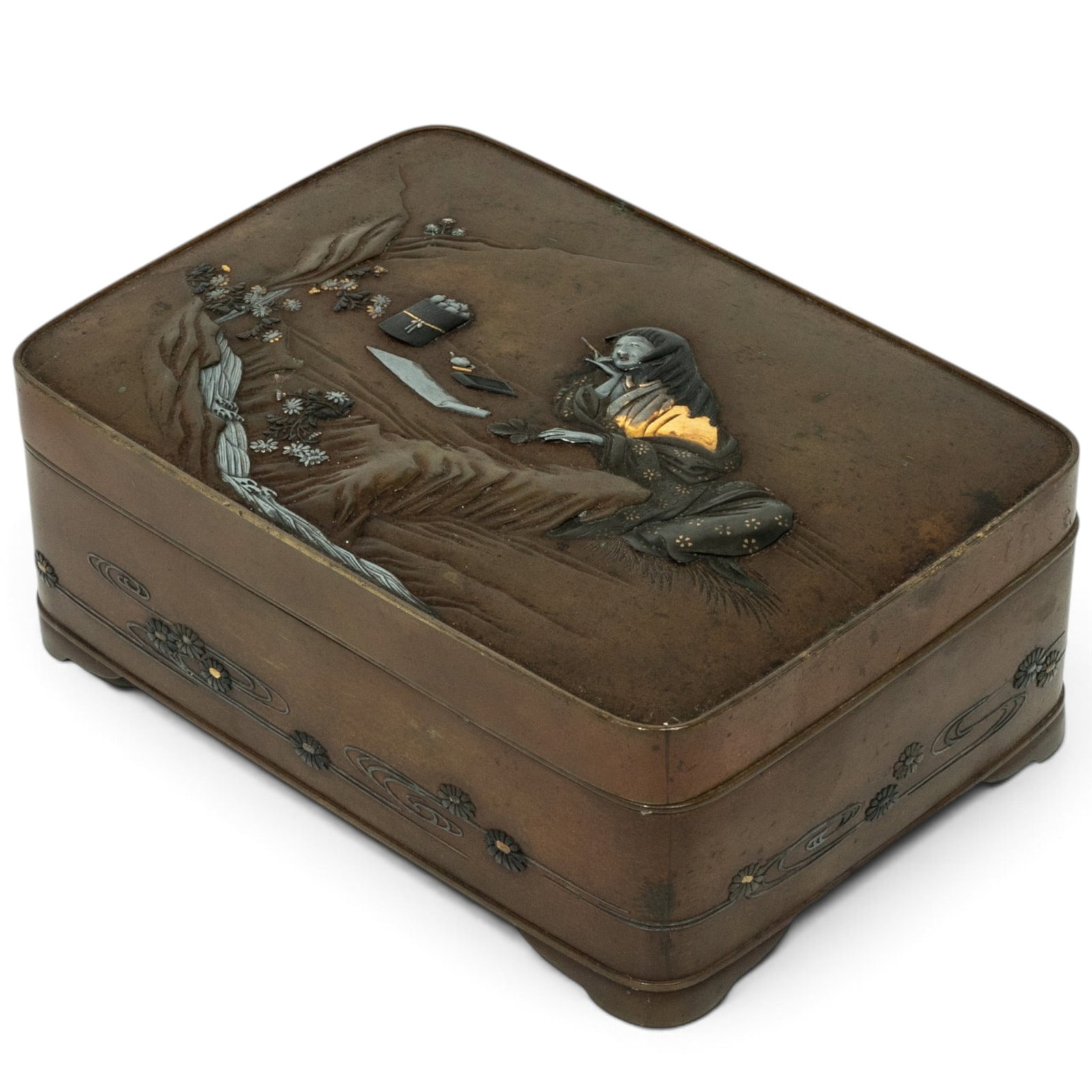 Signed Japanese Mixed Metal Box; Silver, Gold, Shakudo: Signed Japanese Mixed Metal Box; Silver, Gold, Shakudo Meiji period, Japanese This rectangular box with inlay and overlay of soft metal featuring a Japanese woman seated with calligraphy, scroll,