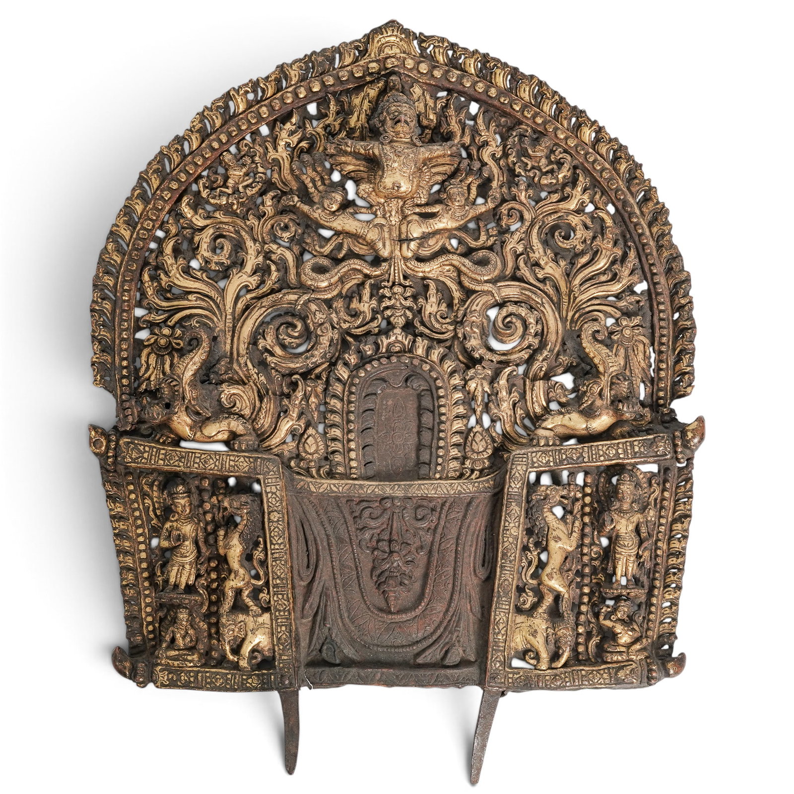Nepalese 16th-17th Cent Gilt Copper Prabhamandala: Nepalese 16th-17th Cent Gilt Copper Prabhamandala 16th-17th century, Nepalese This large and well chased delicately worked prabhamandala. At the crest, a projecting Garuda reigns, flanked by makaras