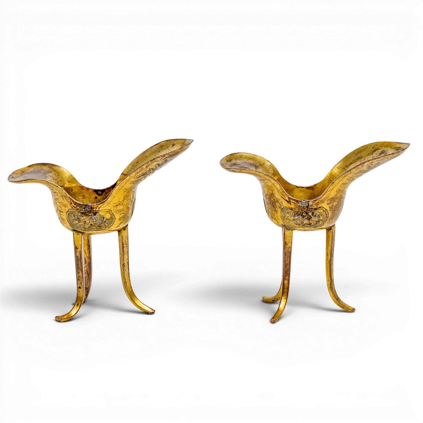 Matched Pair of Chinese Gilt Copper Ritual Wine Cups (Jue): Matched Pair of Chinese Gilt Copper Ritual Wine Cups (Jue) Kangxi period (17th-18th century), Chinese This is a matched pair of finely engraved Chinese gilt copper ritual wine cups ("Jue"). Two-panel