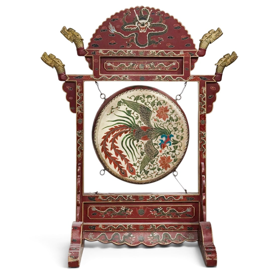 Chinese Red Lacquered Temple Drum & Stand: Chinese Red Lacquered Temple Drum & Stand 20th century, Chinese The red lacquered stand with lacquered hand-painted dragons to top, sides, and bottom. The top section of stand with gilt dragon head