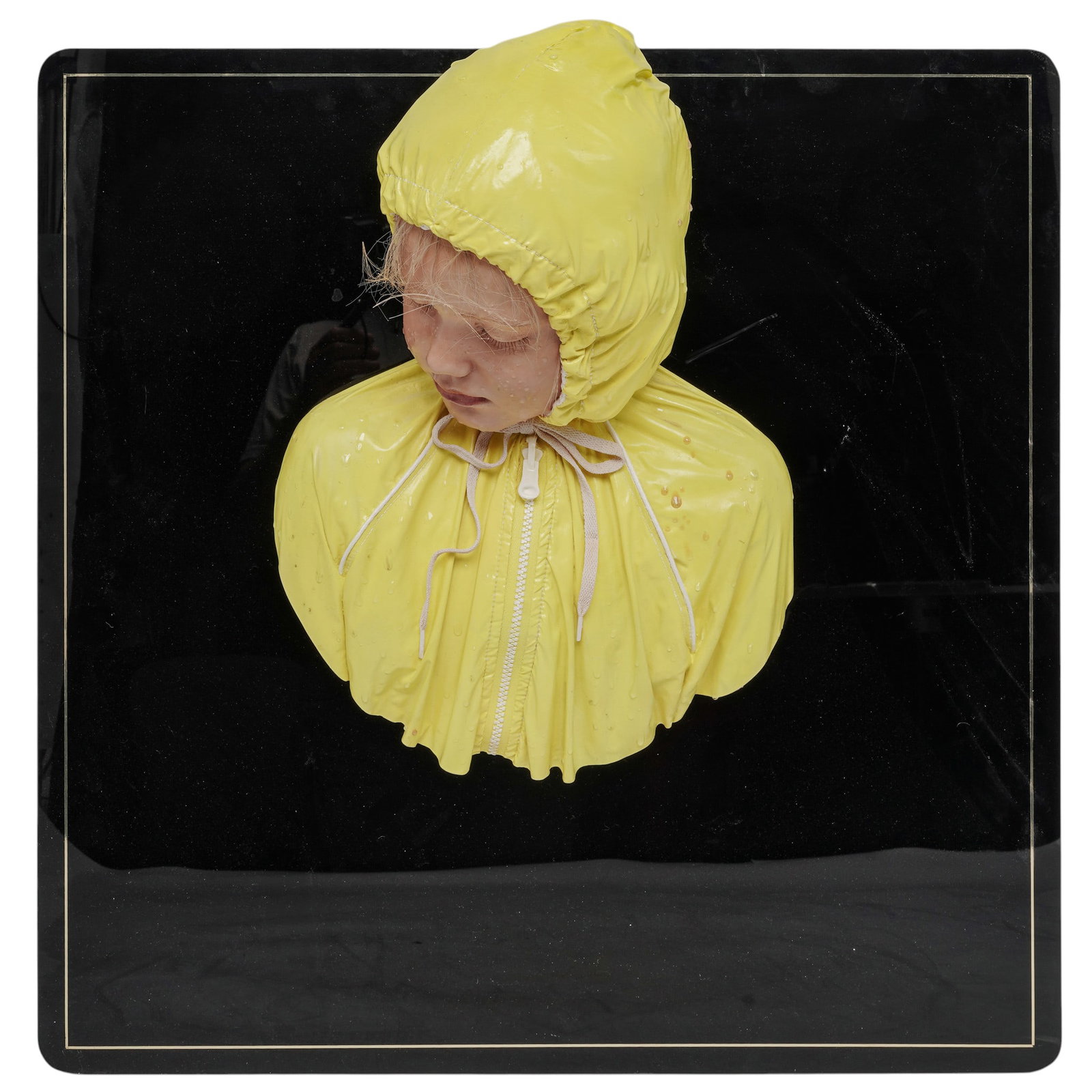 Carole Feuerman (American, 1945-) "Rain Coat" Oil Painted Resin Sculpture: Carole Feuerman (American, 1945-) "Rain Coat" Oil Painted Resin Sculpture 1994, USA A hyperrealist bust depicting a young child with closed eyes and finely rendered facial features, wearing a bright