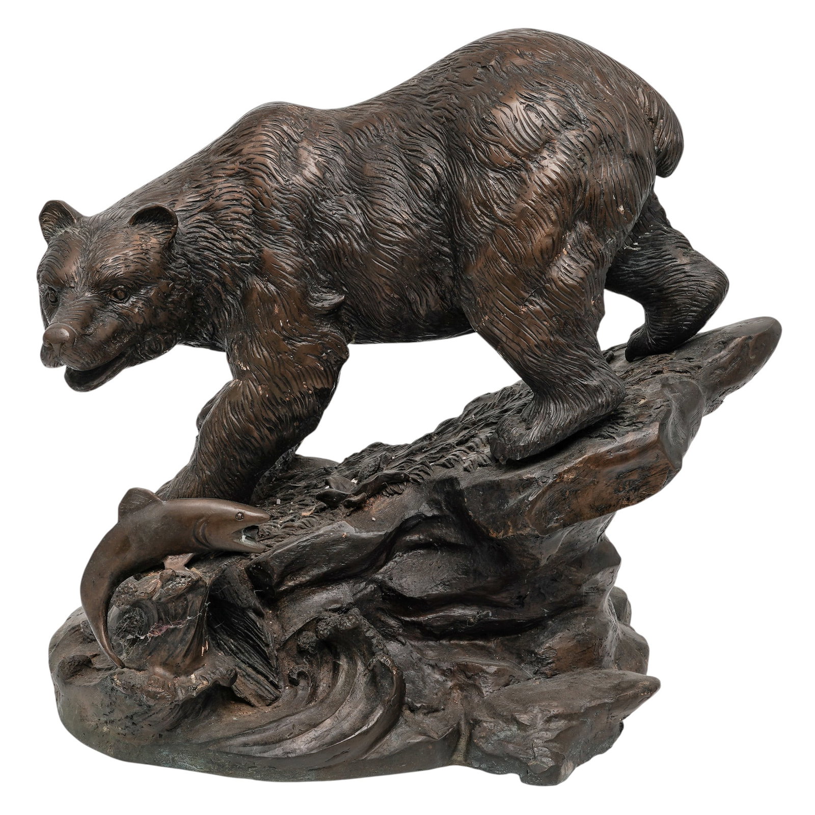 Large Bronze Bear & Fish Sculpture: Large Bronze Bear & Fish Sculpture Late 20th Century, USA A large bronze wildlife sculpture depicting a bear in a dynamic forward-moving pose atop a naturalistic rocky base, with finely textured fur a