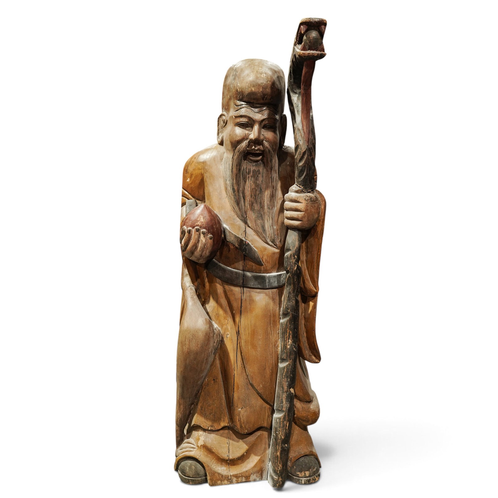 Vintage Chinese Carved Wood Shou Lao Sculpture: Vintage Chinese Carved Wood Shou Lao Sculpture Mid-20th Century, China Vintage Chinese carved wood sculpture depicting Shou Lao, the Daoist god of longevity, standing and holding a peach of