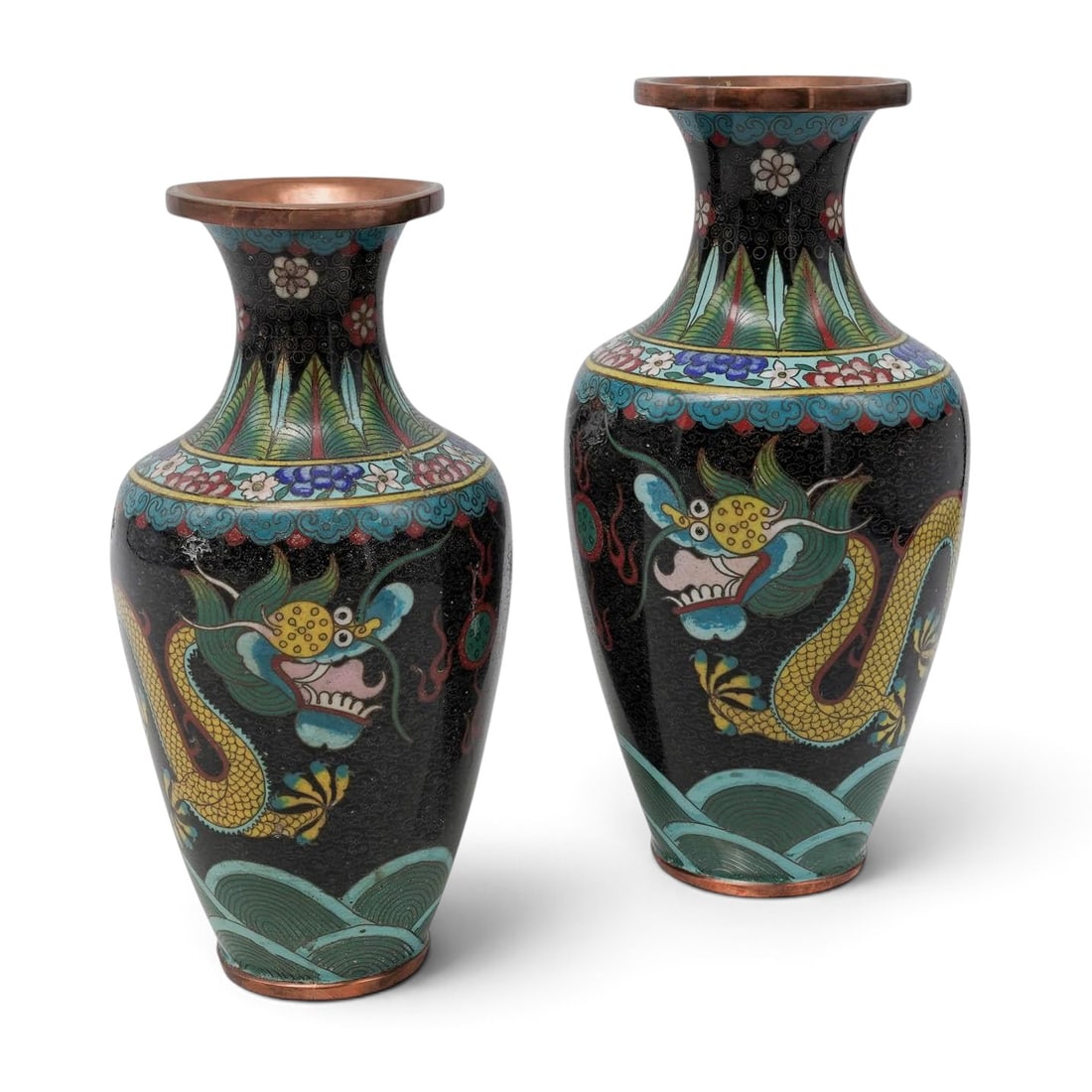 Pair of Vintage Chinese Cloisonné Dragon Vases: Pair of Vintage Chinese Cloisonné Dragon Vases Mid 20th Cent., Chinese Hand-crafted on a copper body, featuring intricately enameled multicolored imperial dragons winding across a glossy black ground
