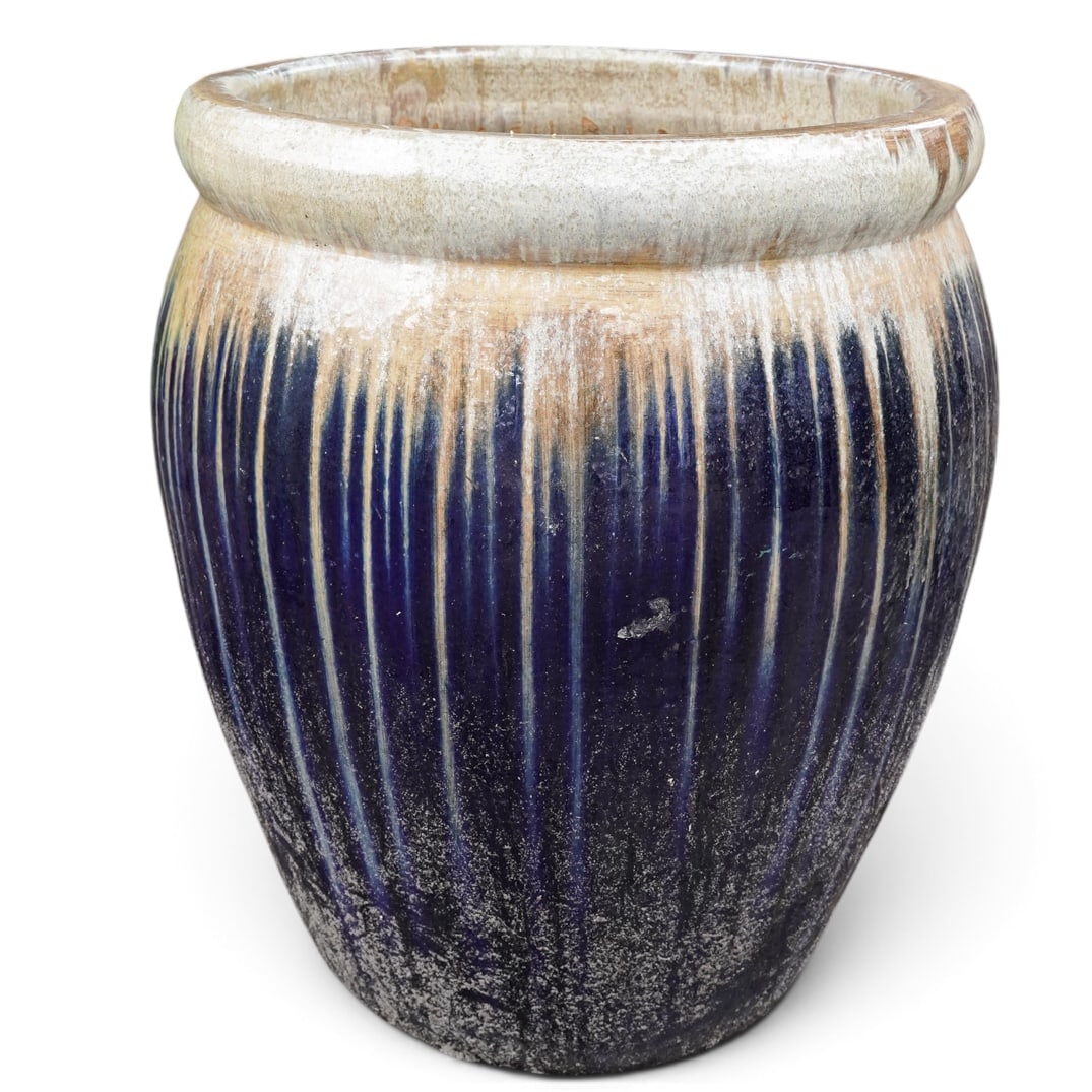 Large Blue Drip Glazed Planter: Large Blue Drip Glazed Planter 20th century Large, round ceramic garden planter featuring a striking cobalt blue and cream drip-glaze finish with vertical fluted texture. H 28" x Diameter 23.25"